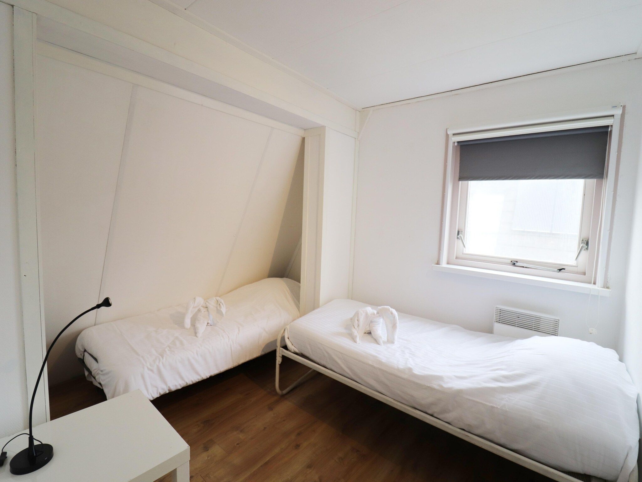 Een slaapkamer van Yn'e Lijte 105 in Grou