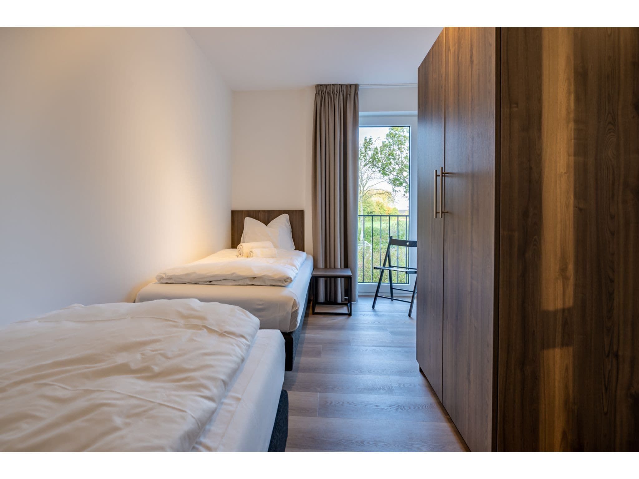 Een slaapkamer van Harbour Loft 1N Résidence Marina polderzicht in Kamperland