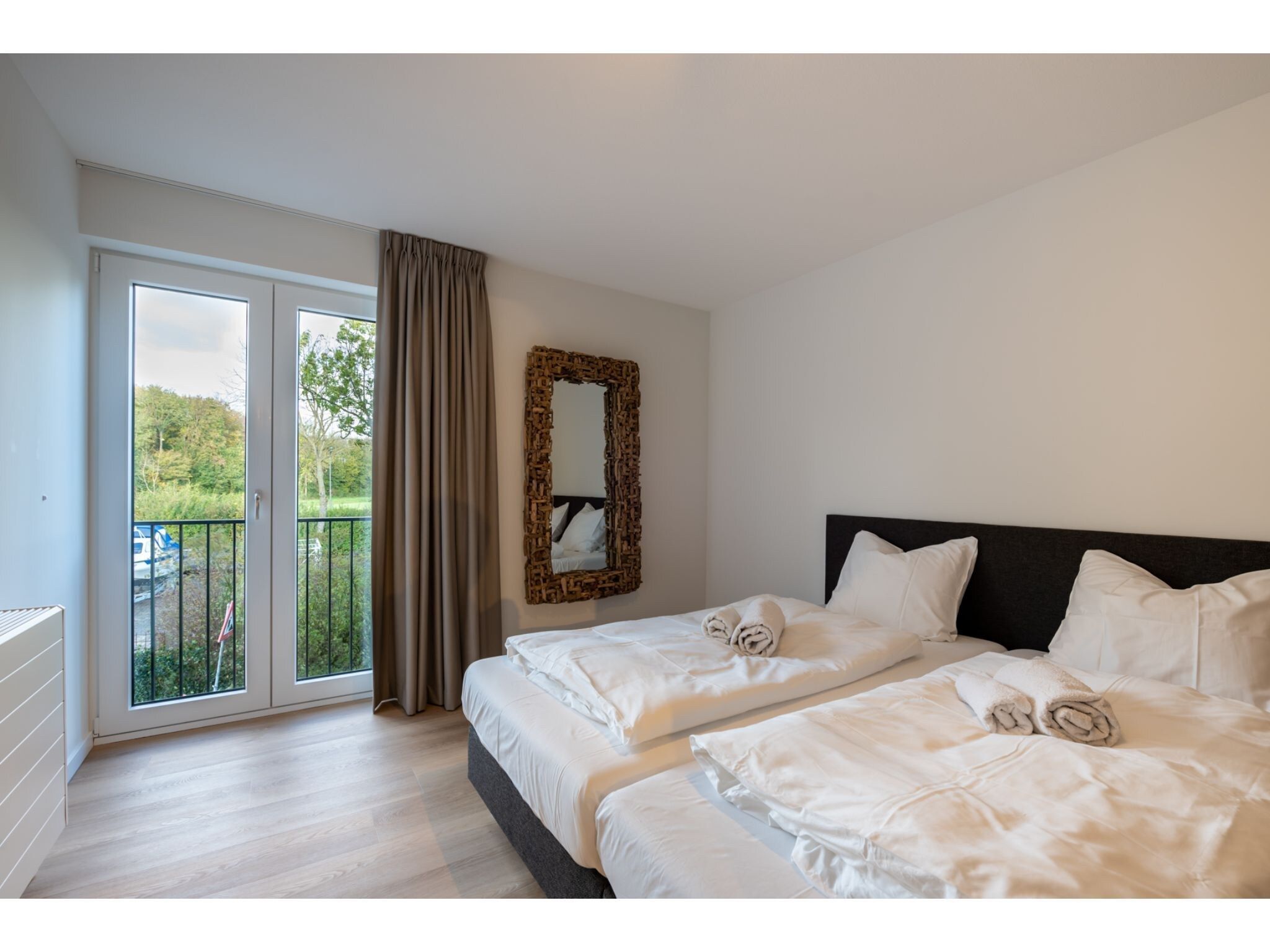 Een slaapkamer van Harbour Loft 1N Résidence Marina polderzicht in Kamperland