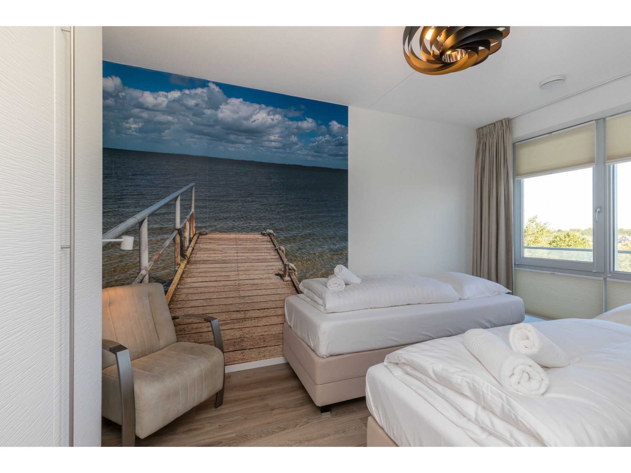 Een slaapkamer van De Zeester Gorishoeksedijk 41 in Scherpenisse