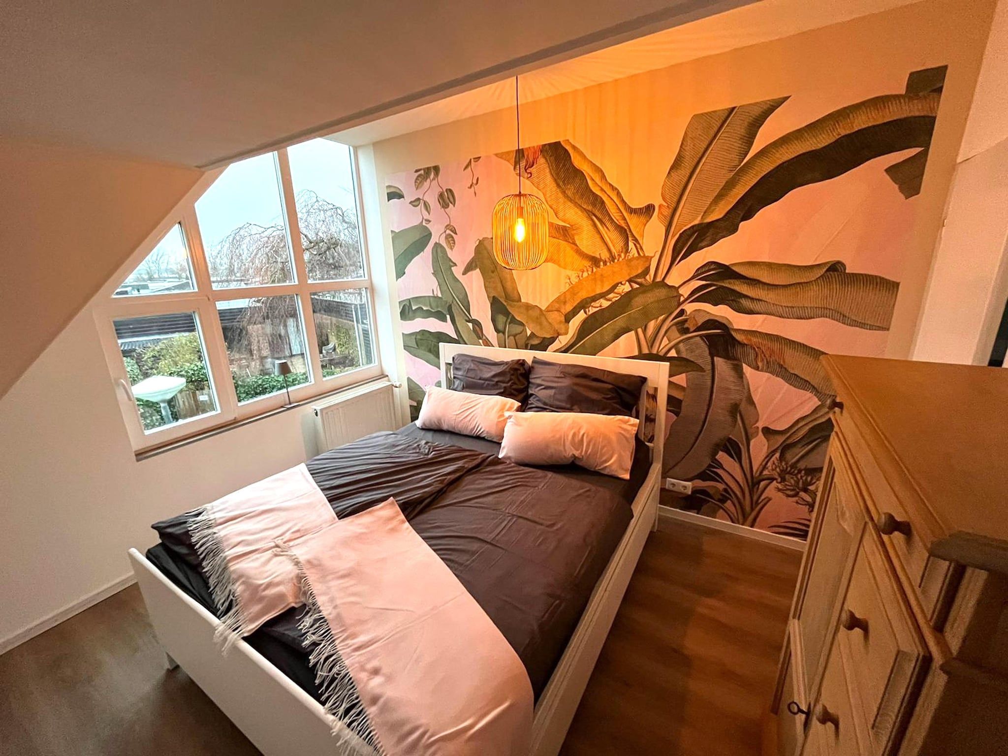 Een slaapkamer van Ferienhaus White Pearl in Noordwijkerhout