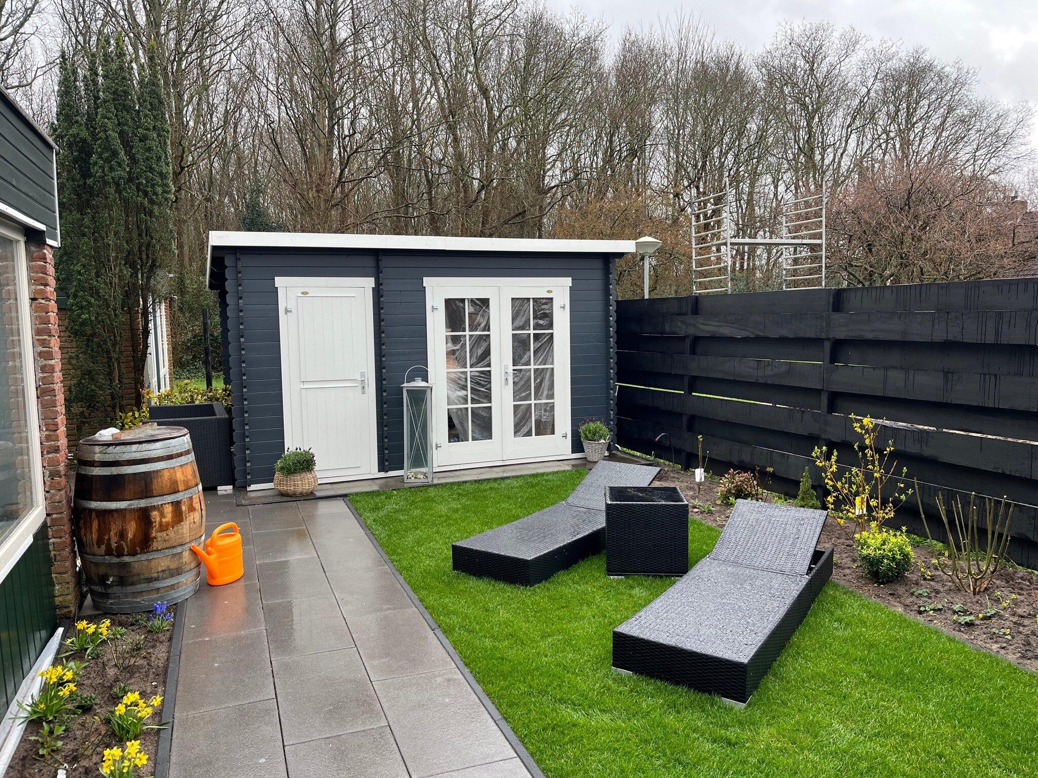 De tuin van Ferienhaus White Pearl in Noordwijkerhout