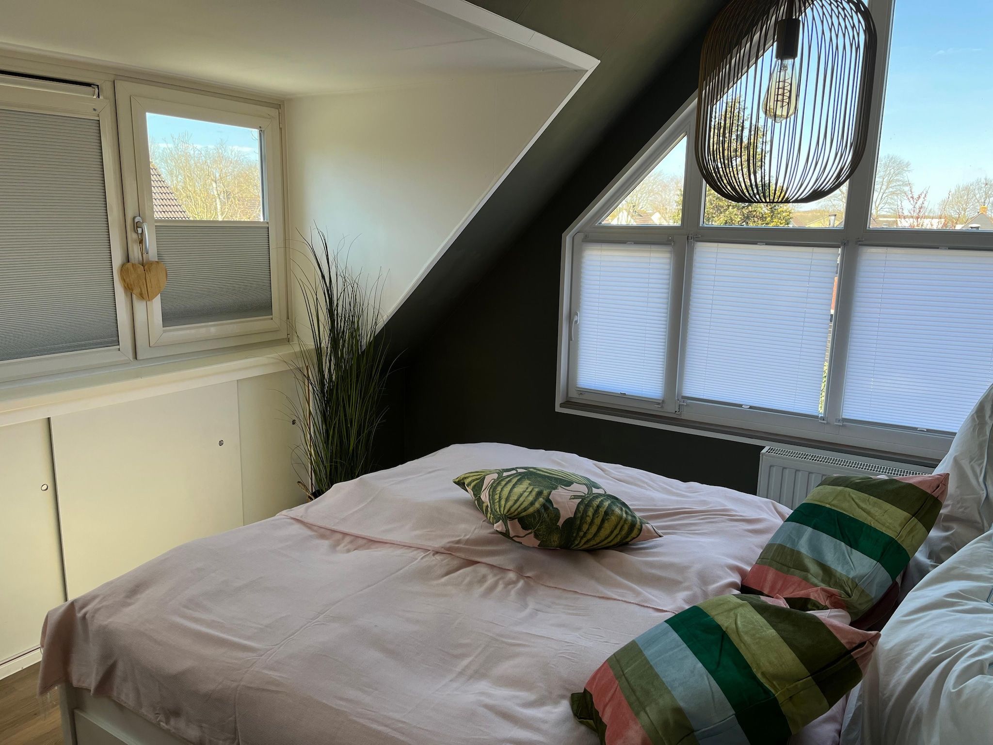 Een slaapkamer van Ferienhaus White Pearl in Noordwijkerhout