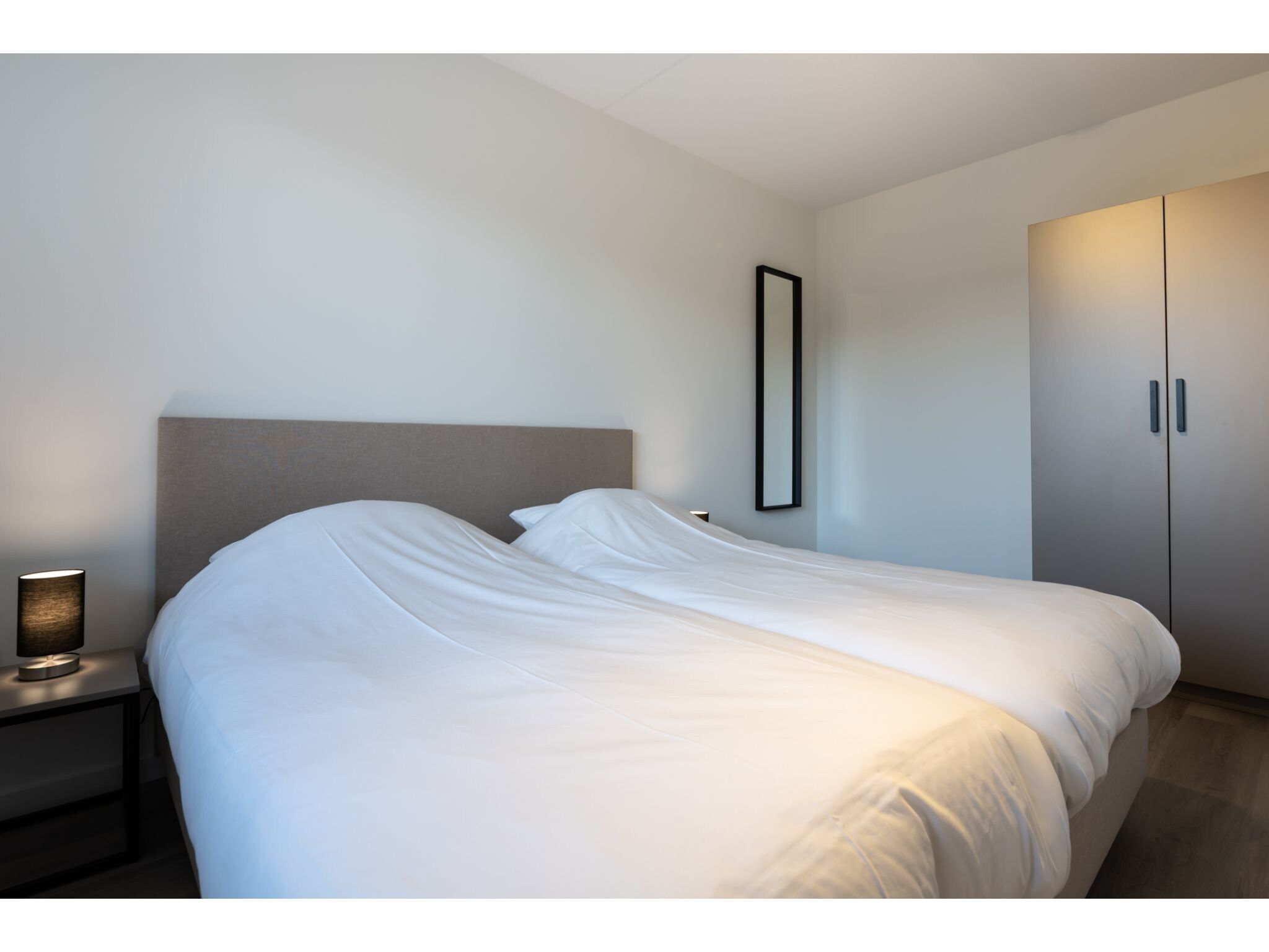 Een slaapkamer van Harbour Loft 1K Residence Marina havenzicht in Kamperland