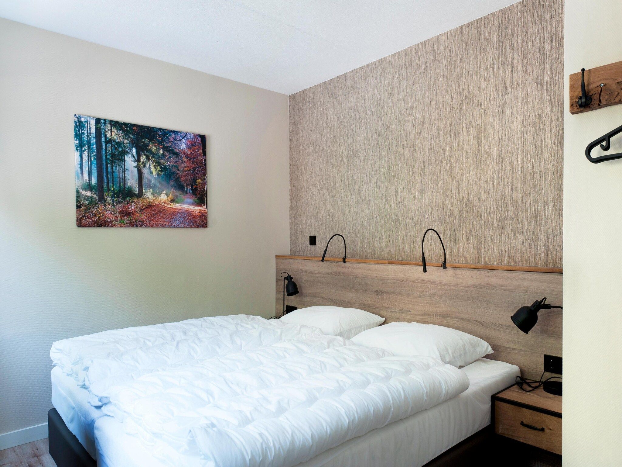 Een slaapkamer van 8 pers Metbroekhuis Wellness de luxe met sauna & buitenspa in Groningen