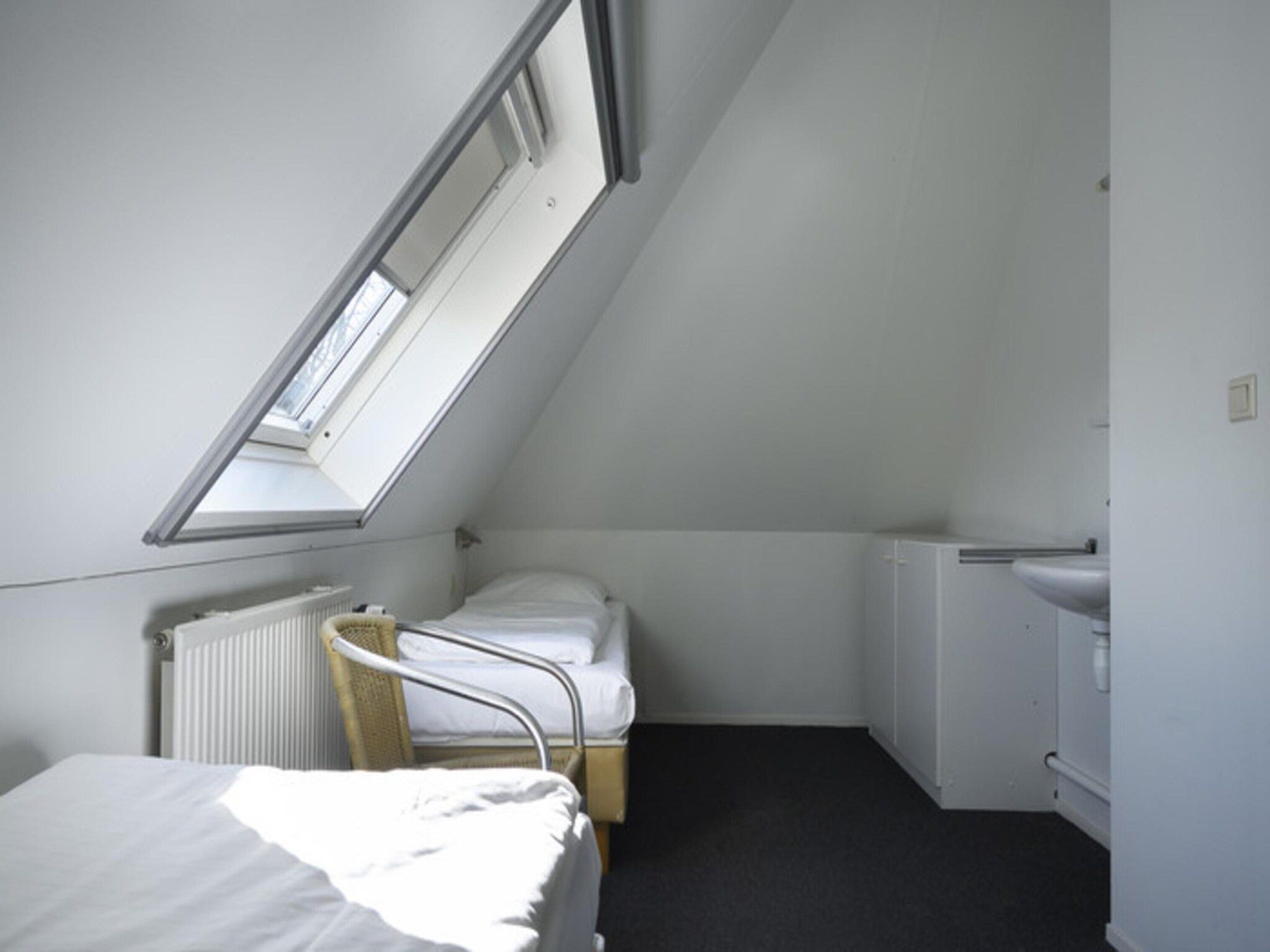 Een slaapkamer van Skip Wellness de luxe met sauna in Friesland