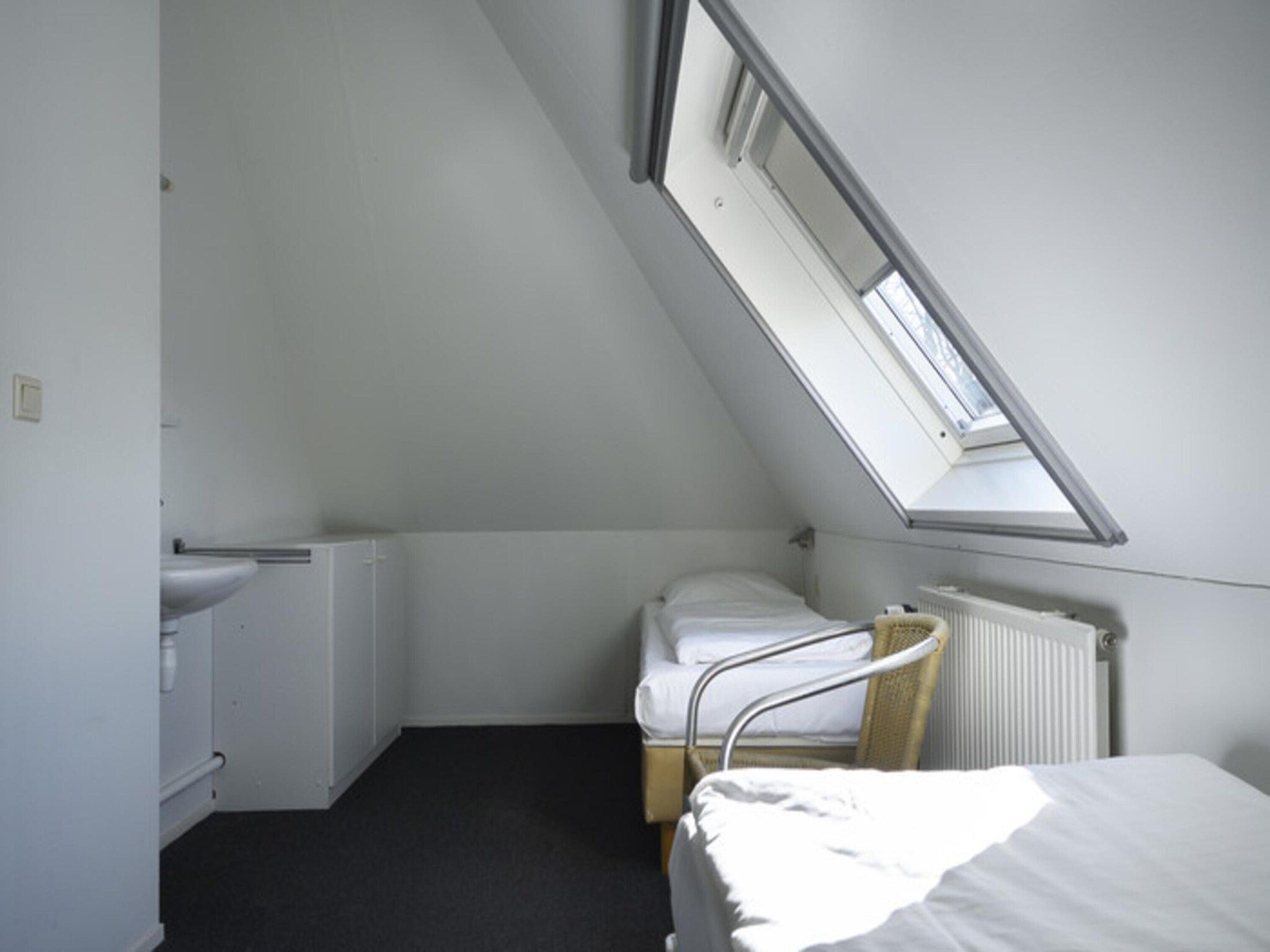 Een slaapkamer van Skip Wellness de luxe met sauna in Friesland