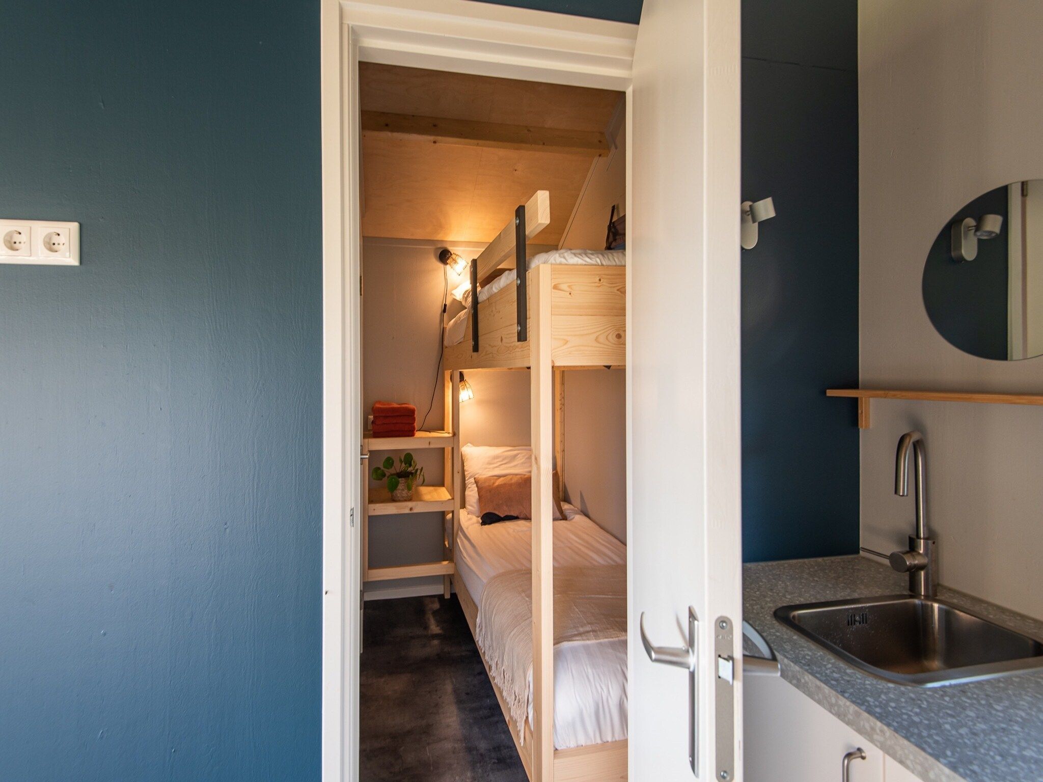 Een slaapkamer van Acker Lodges 1 in Ruinerwold
