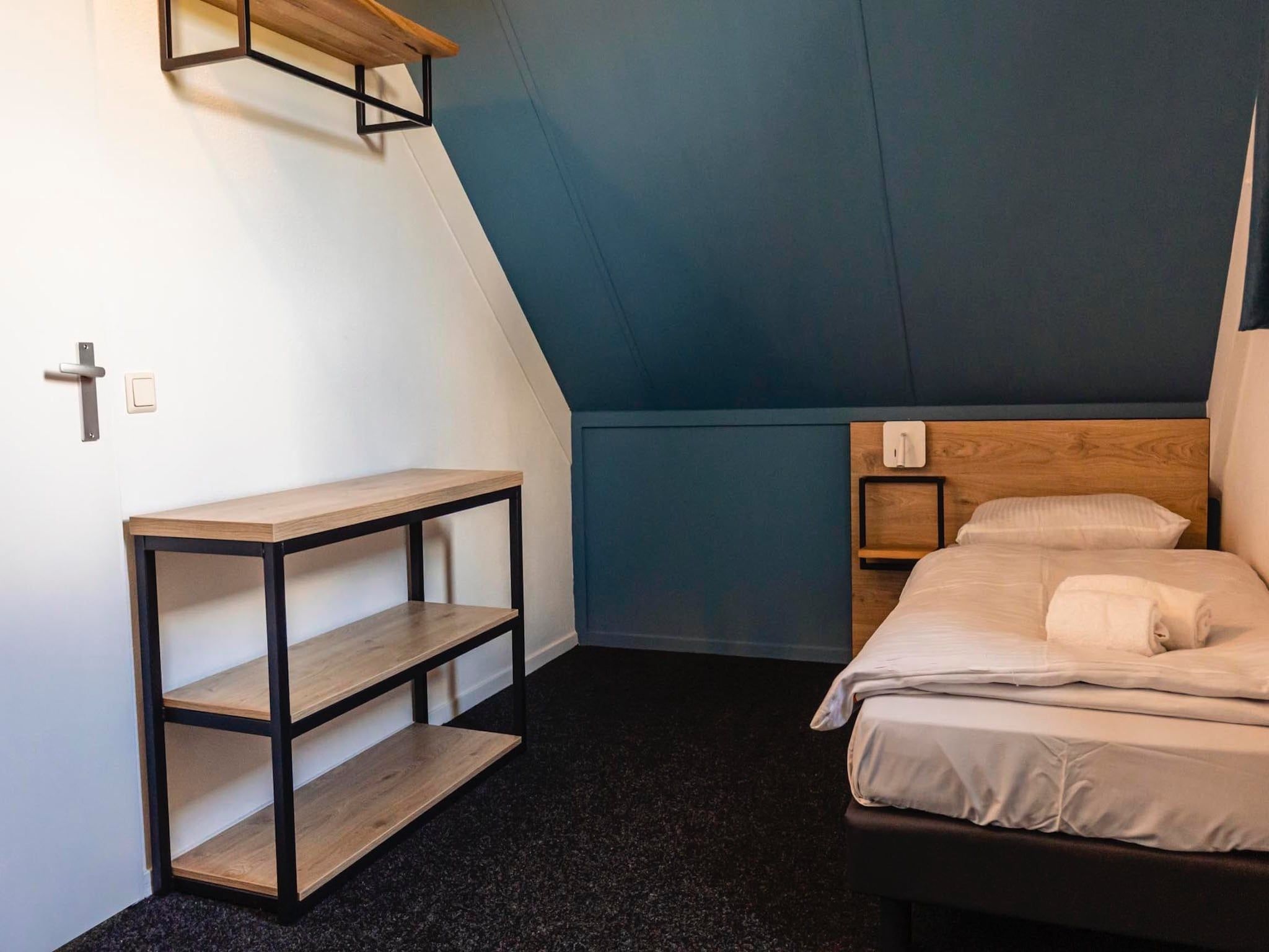 Een slaapkamer van Vakantiepark 't Broeckhuys 1 in Ewijk