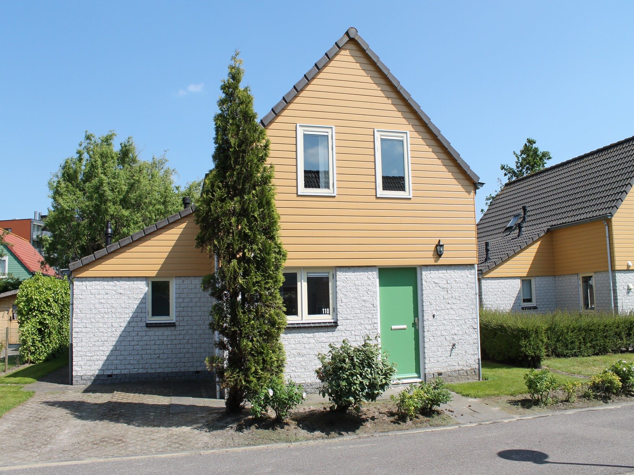 De buitenkant van Villapark De Oesterbaai 110 in Wemeldinge