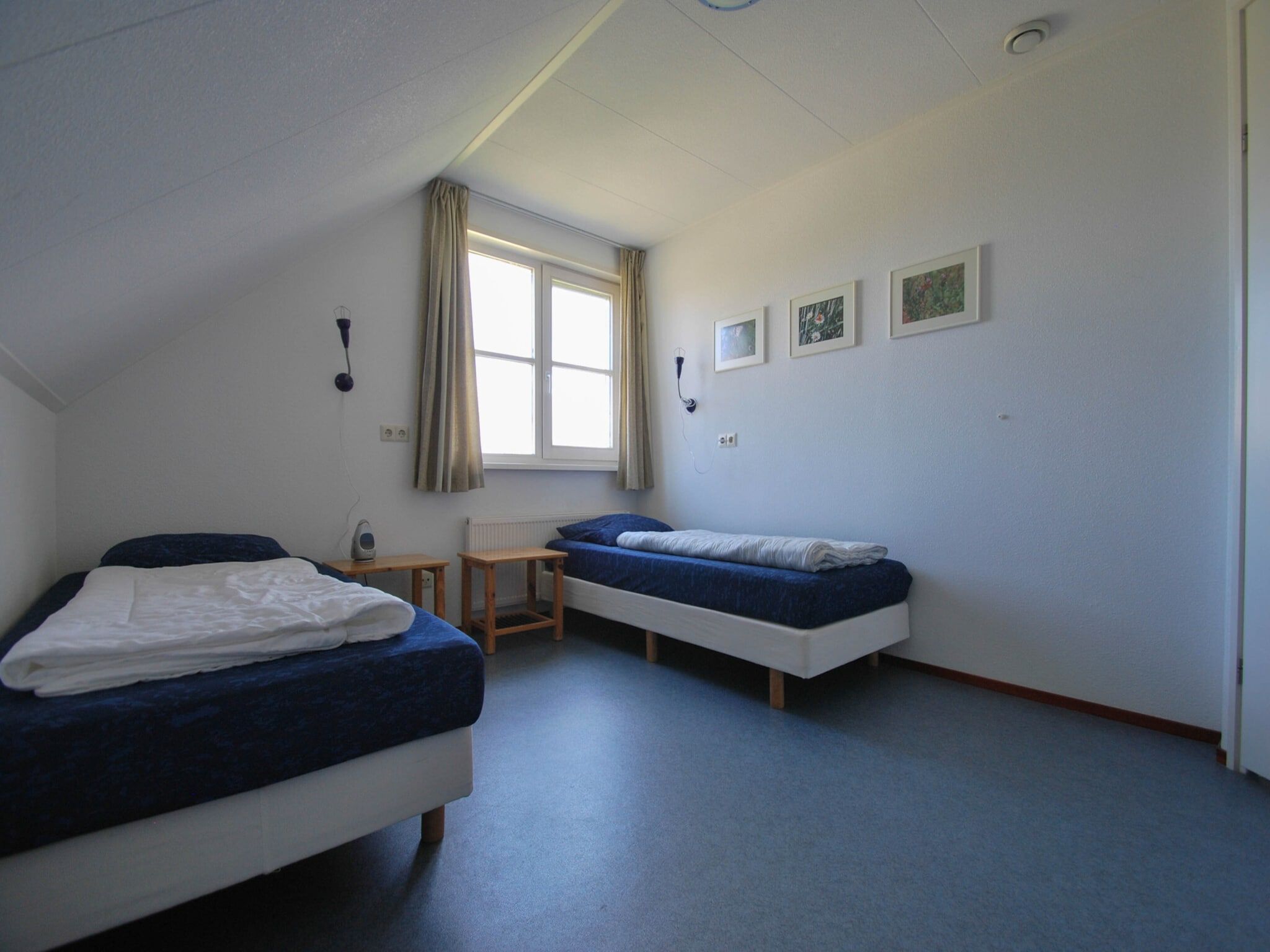 Een slaapkamer van Duinvilla - 4 personen in Makkum