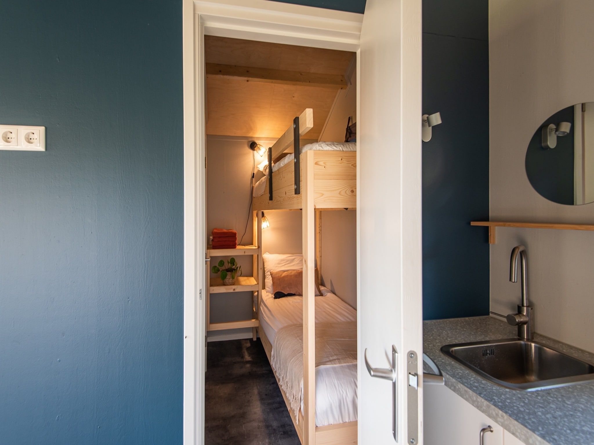Een slaapkamer van Acker Lodges 2 in Ruinerwold