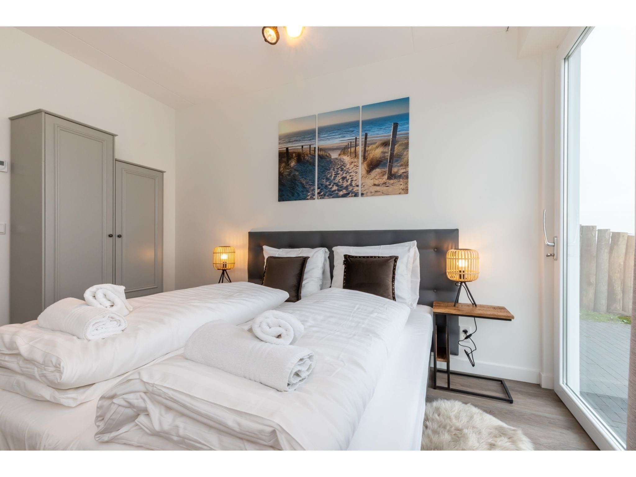 Een slaapkamer van Havenweg 8-14 in St. Annaland