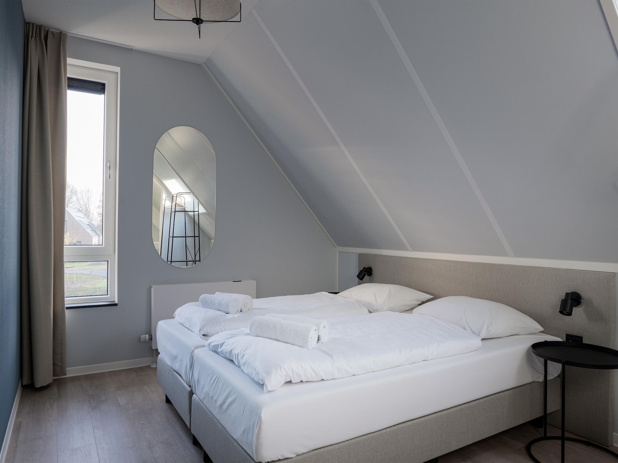 Een slaapkamer van Resort Nieuwvliet-Bad 7 in Nieuwvliet