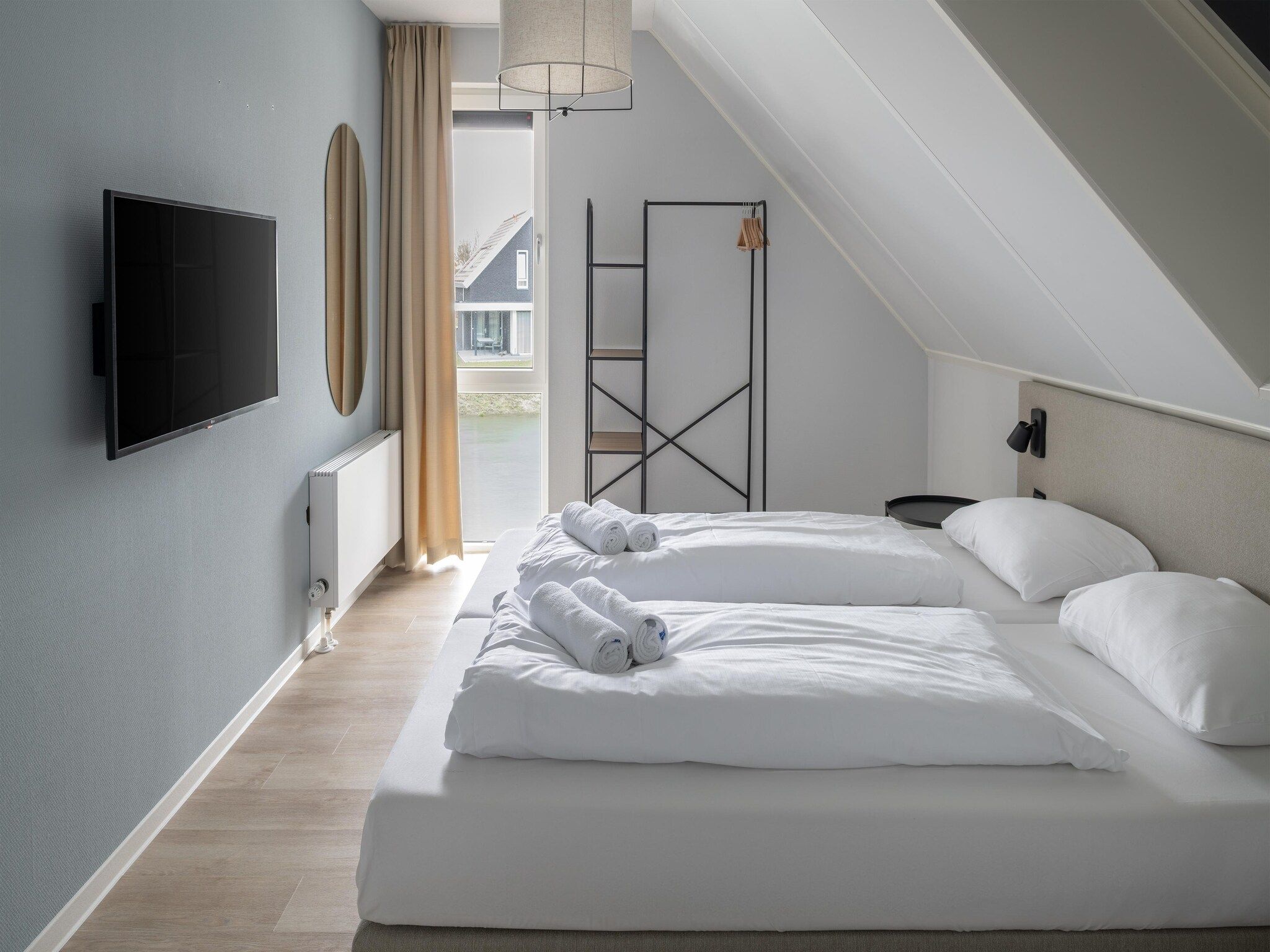 Een slaapkamer van Resort Nieuwvliet-Bad 14 in Nieuwvliet