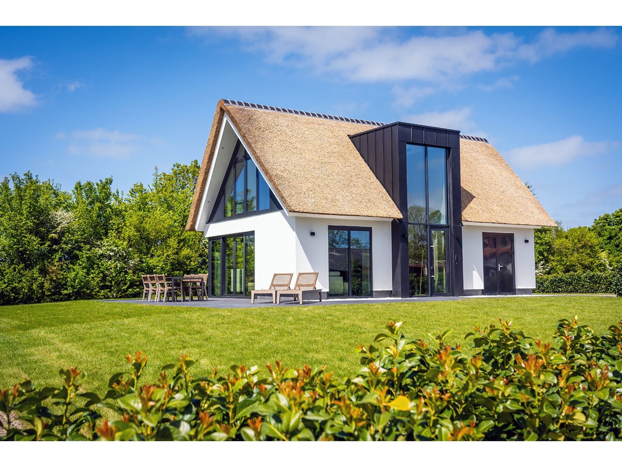De tuin van Type N Luxe Villa Zeeburg in De Cocksdorp