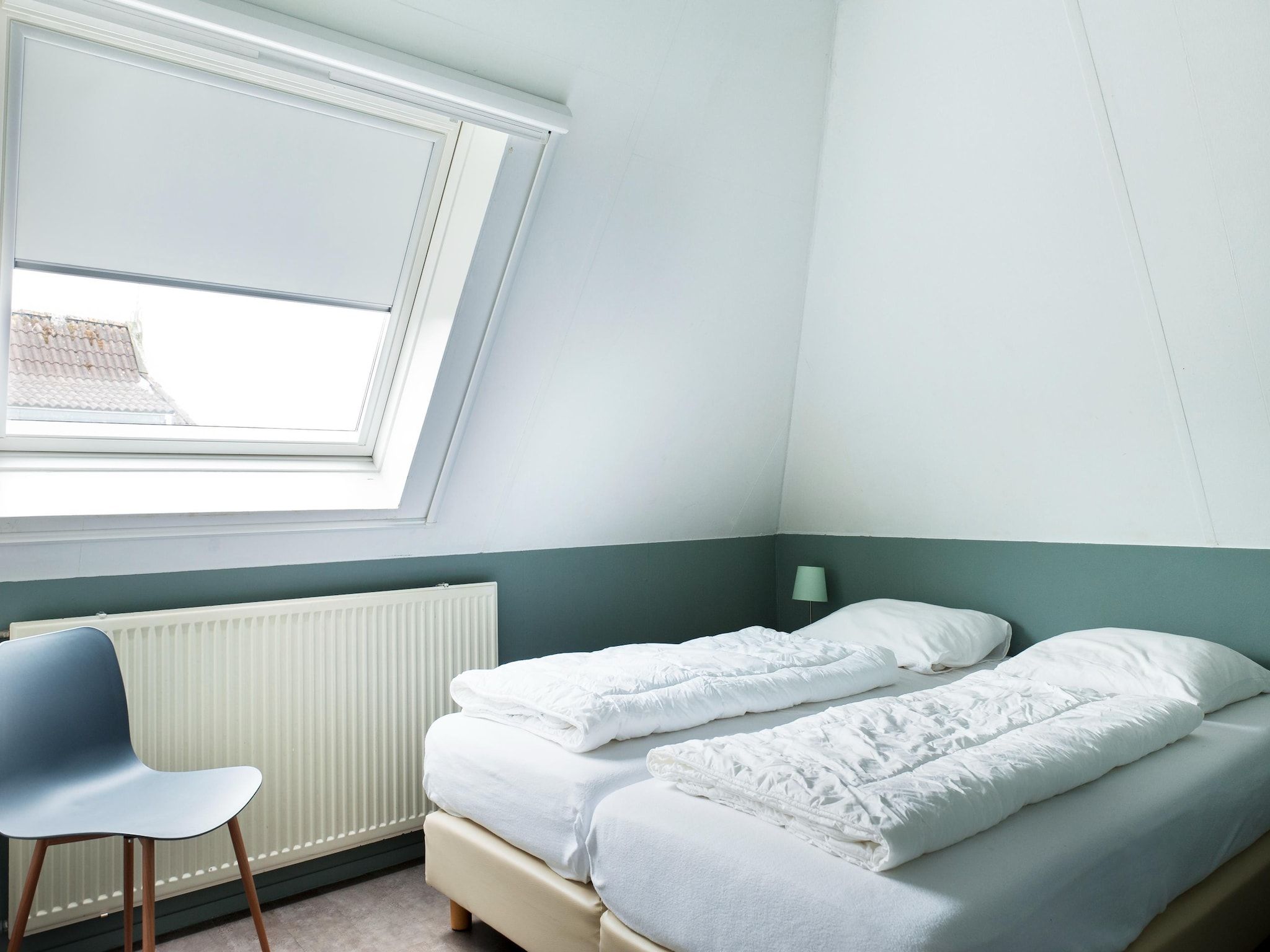 Een slaapkamer van Wiid Wellness de luxe met sauna & buitenspa in Friesland