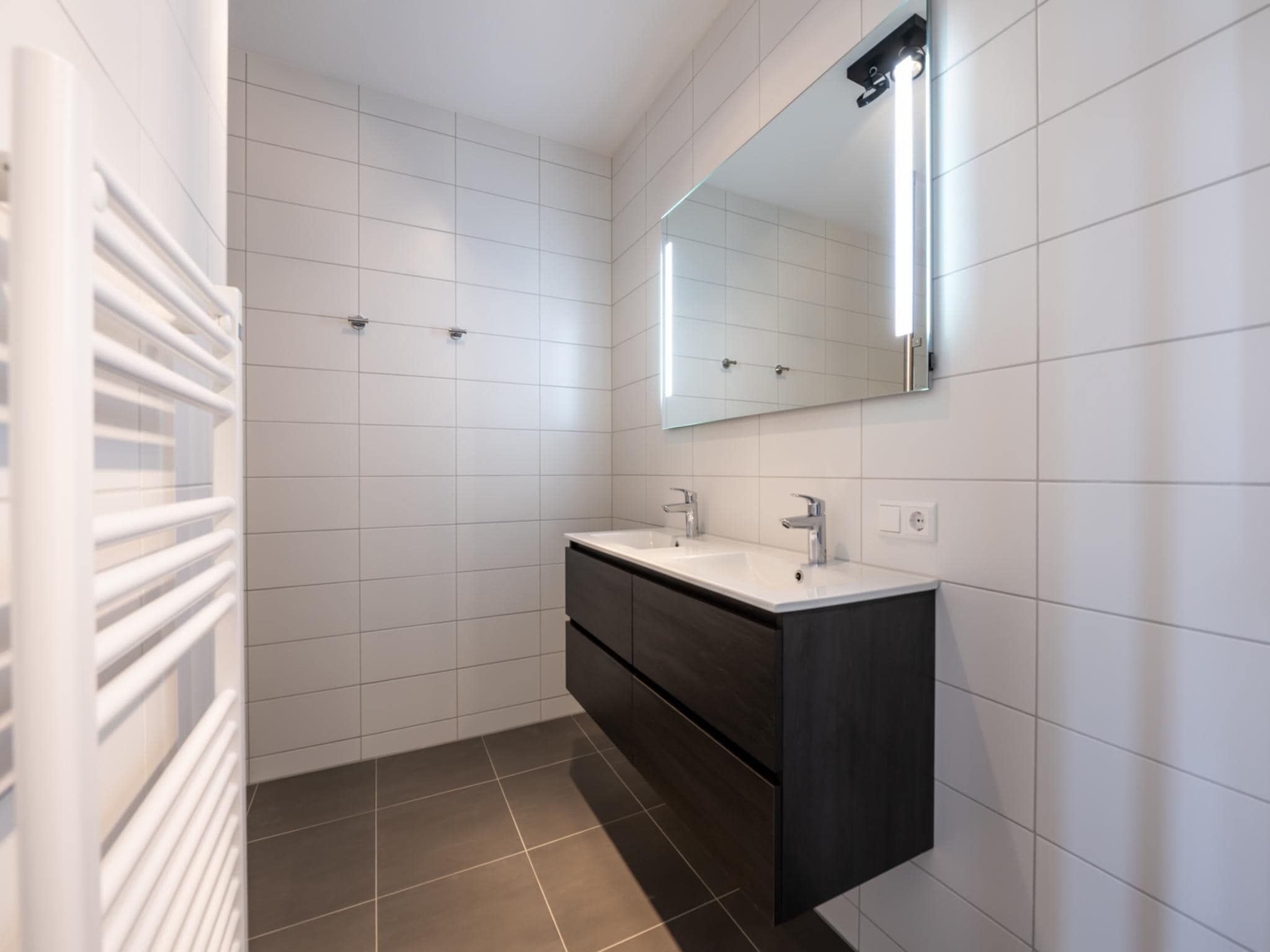 De badkamer van Harbour Loft 1E Résidence Marina havenzicht in Kamperland