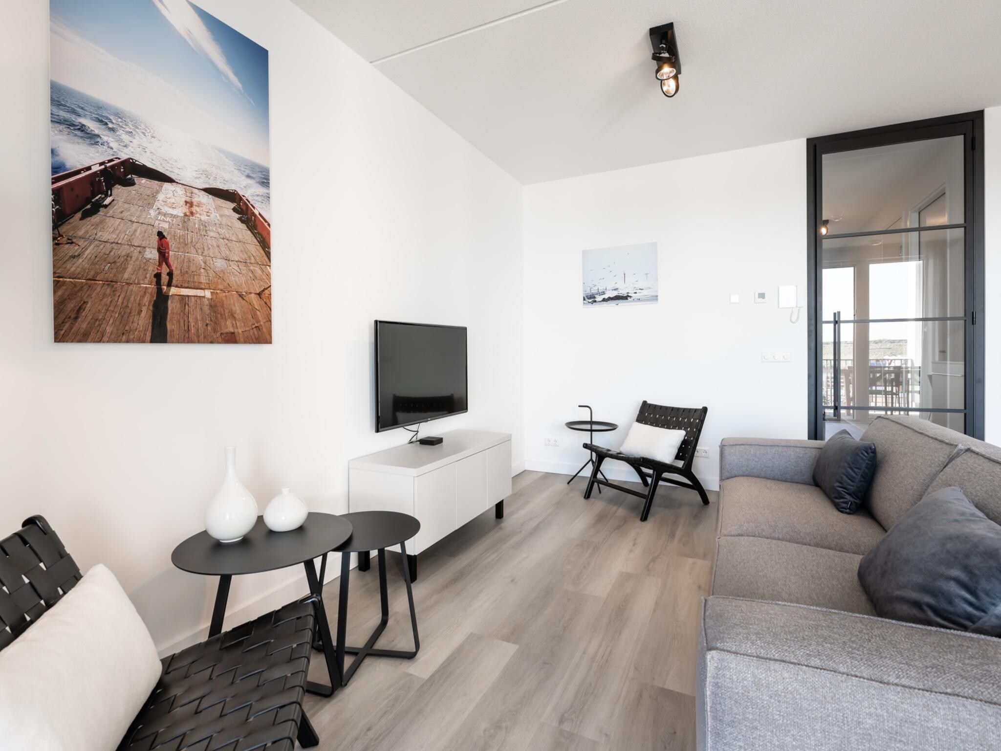 De woonkamer van Harbour Loft 1E Résidence Marina havenzicht in Kamperland