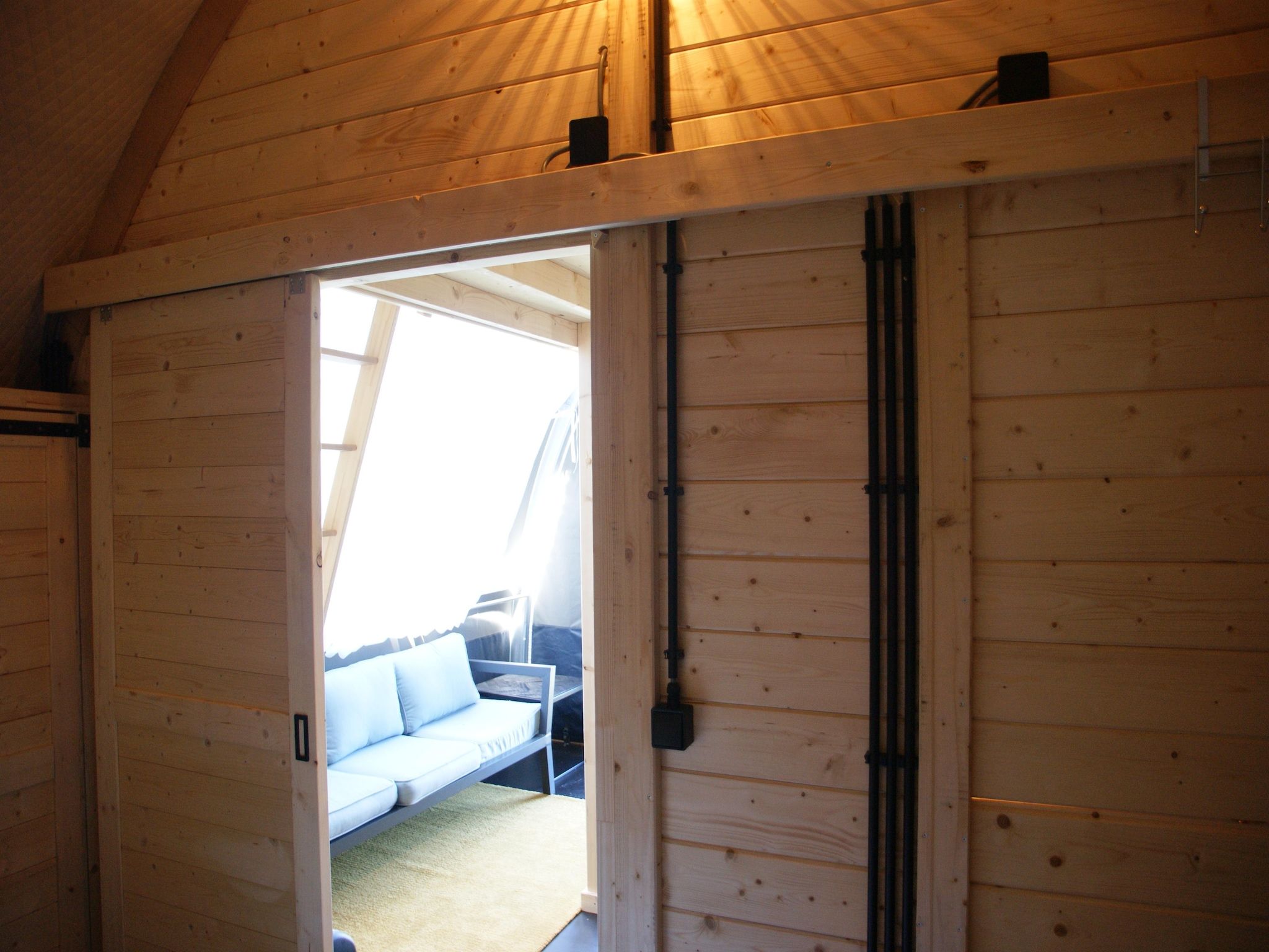 De woonkamer van Tentlodge Fazant in Dalerveen