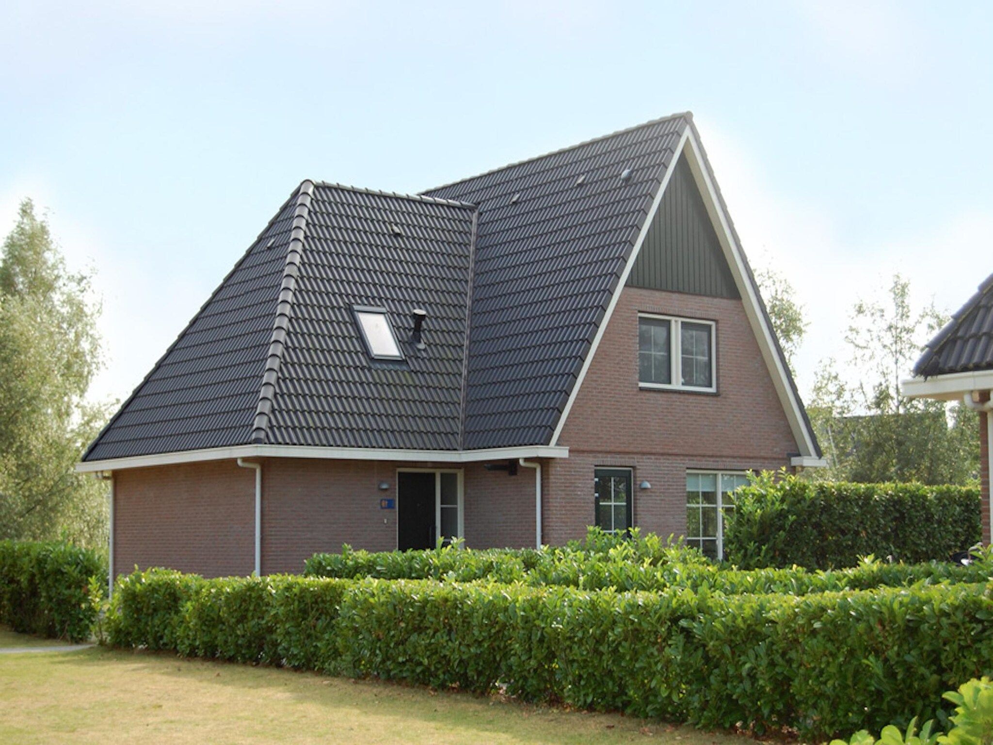De buitenkant van Beachvilla XL - 12 persons in Makkum