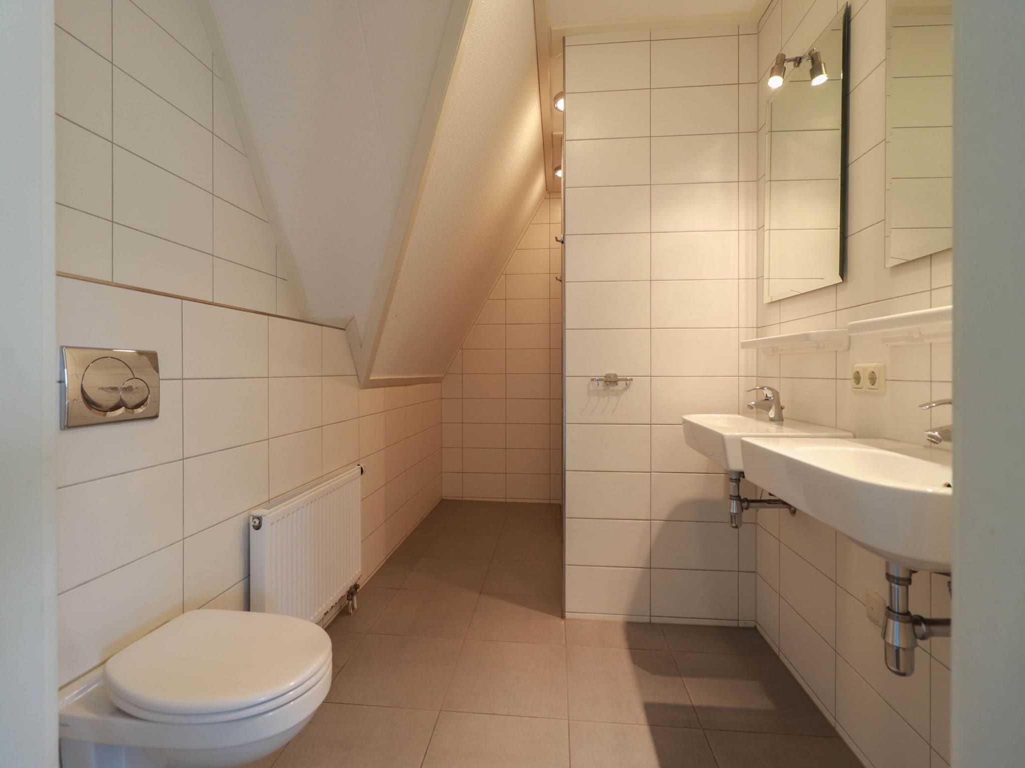 De badkamer van Beachvilla XL - 12 persons in Makkum