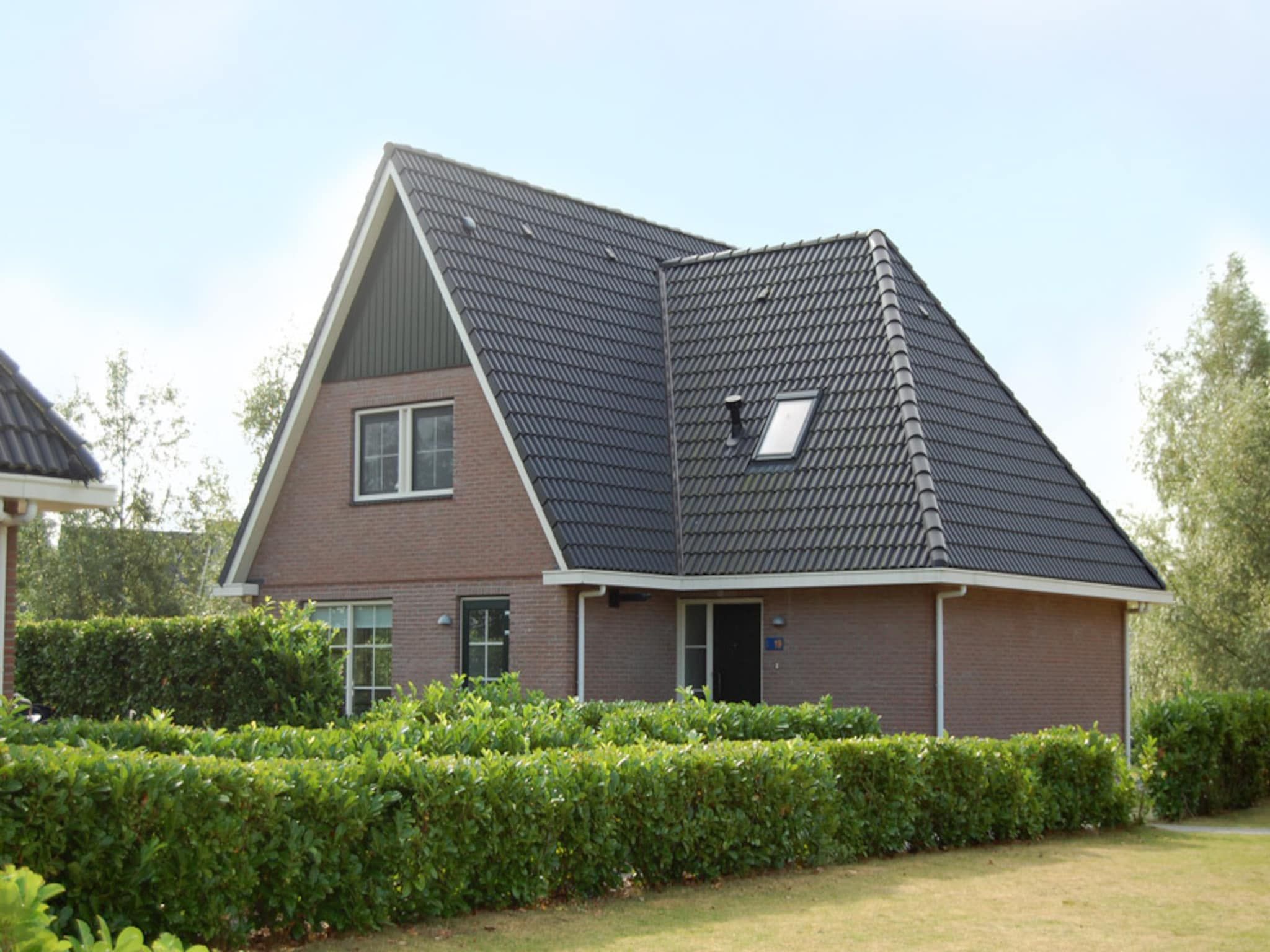 De buitenkant van Beachvilla XL - 12 persons in Makkum