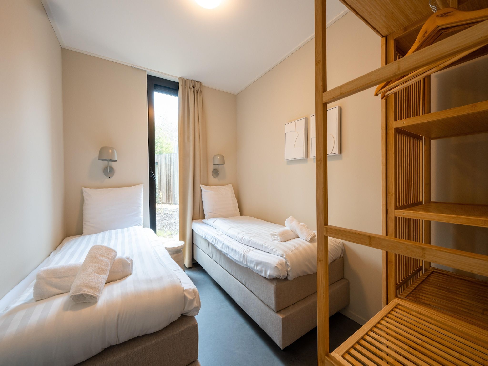 Een slaapkamer van Resort de Parel 12 in Zeewolde