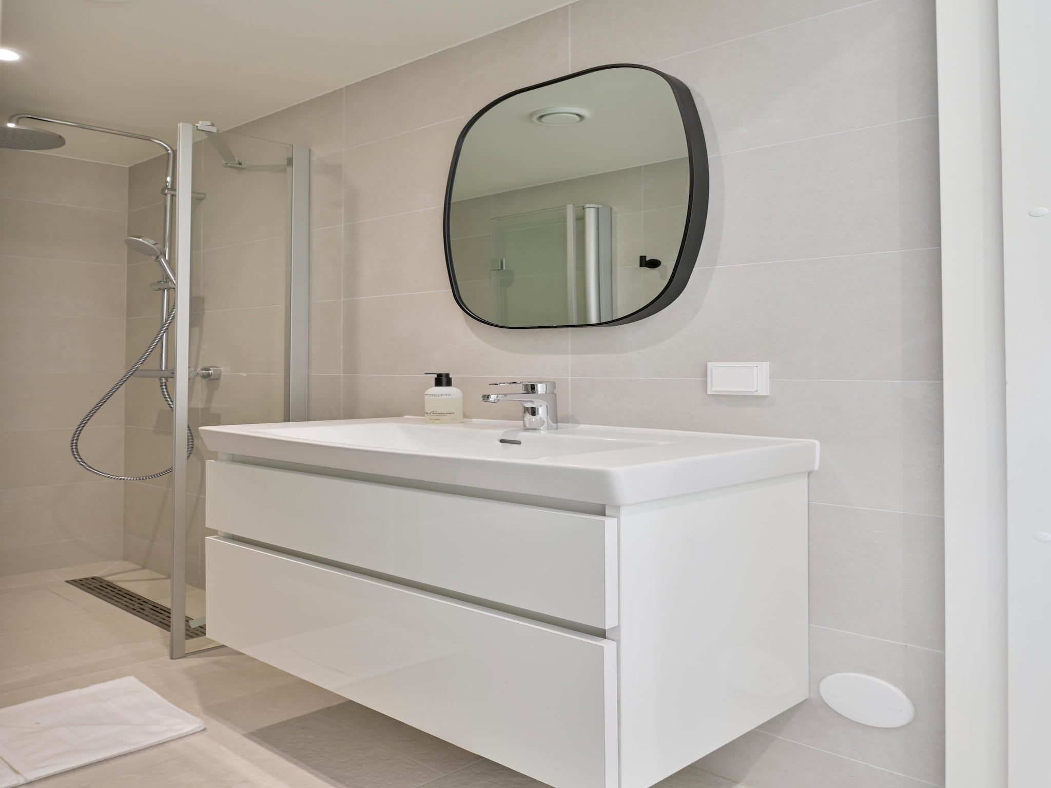 De badkamer van Resort de Parel 15 in Zeewolde