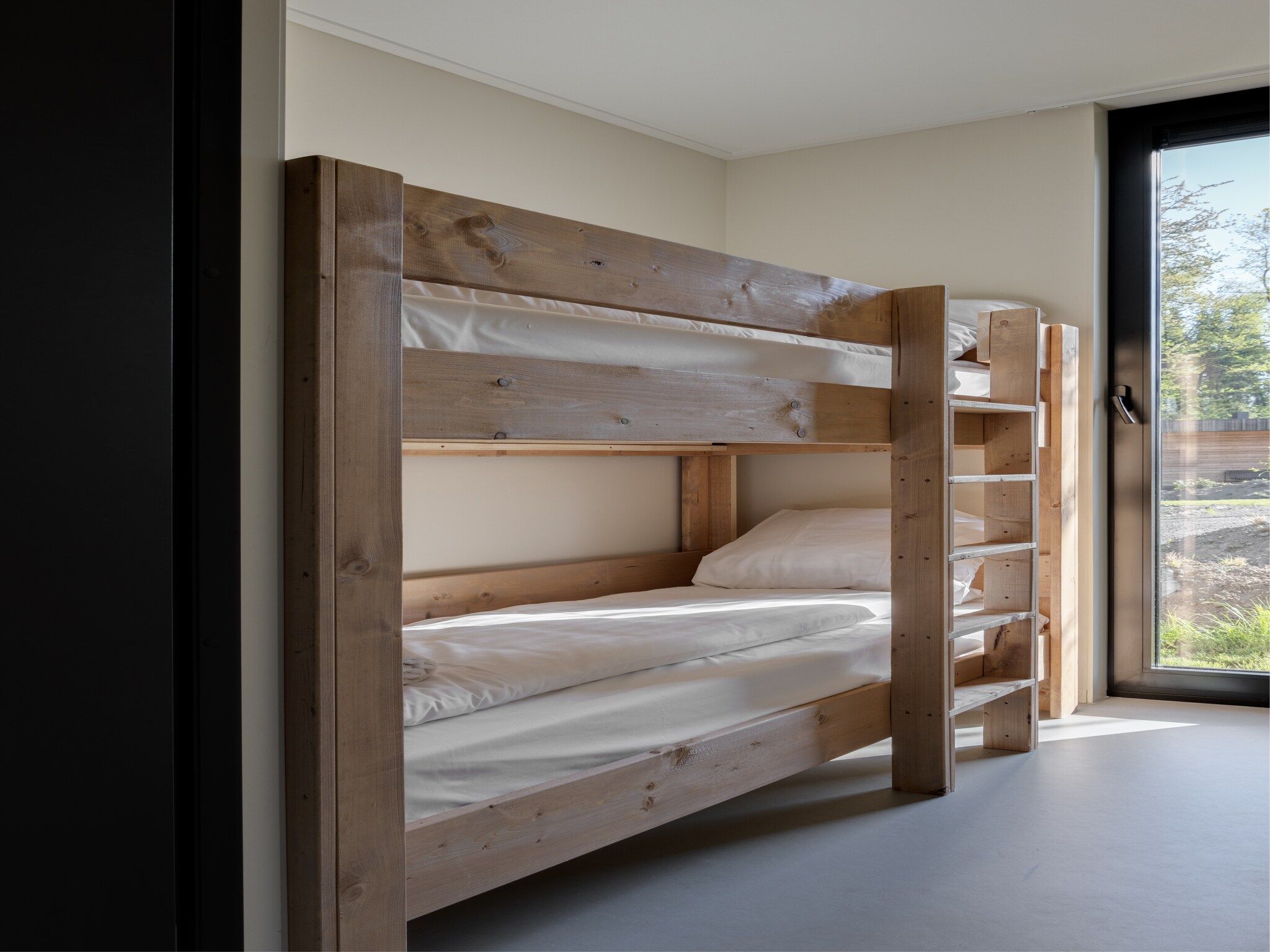 Een slaapkamer van Resort de Parel 15 in Zeewolde