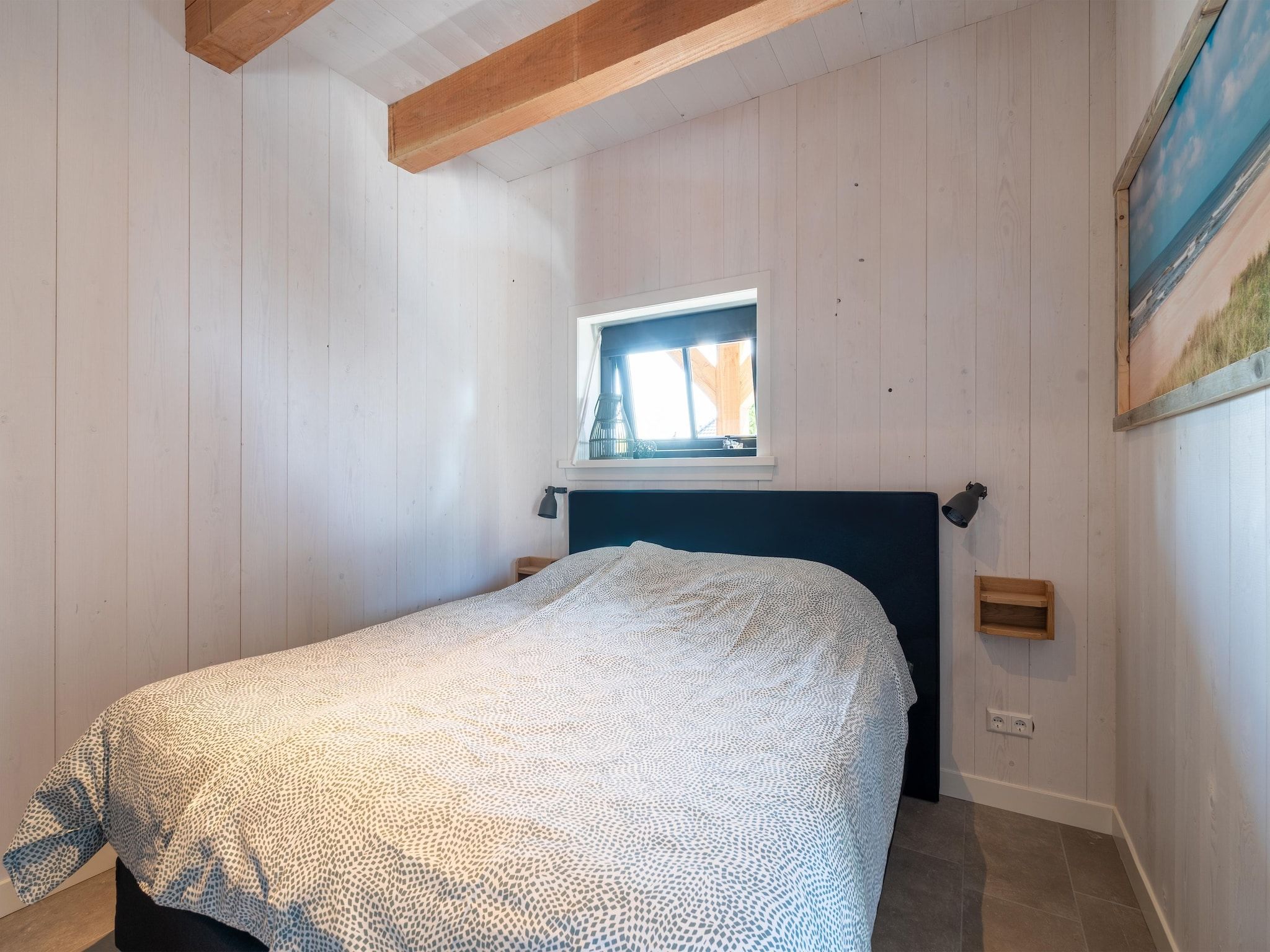 Een slaapkamer van Hazenborgh - Wagenboet in Callantsoog