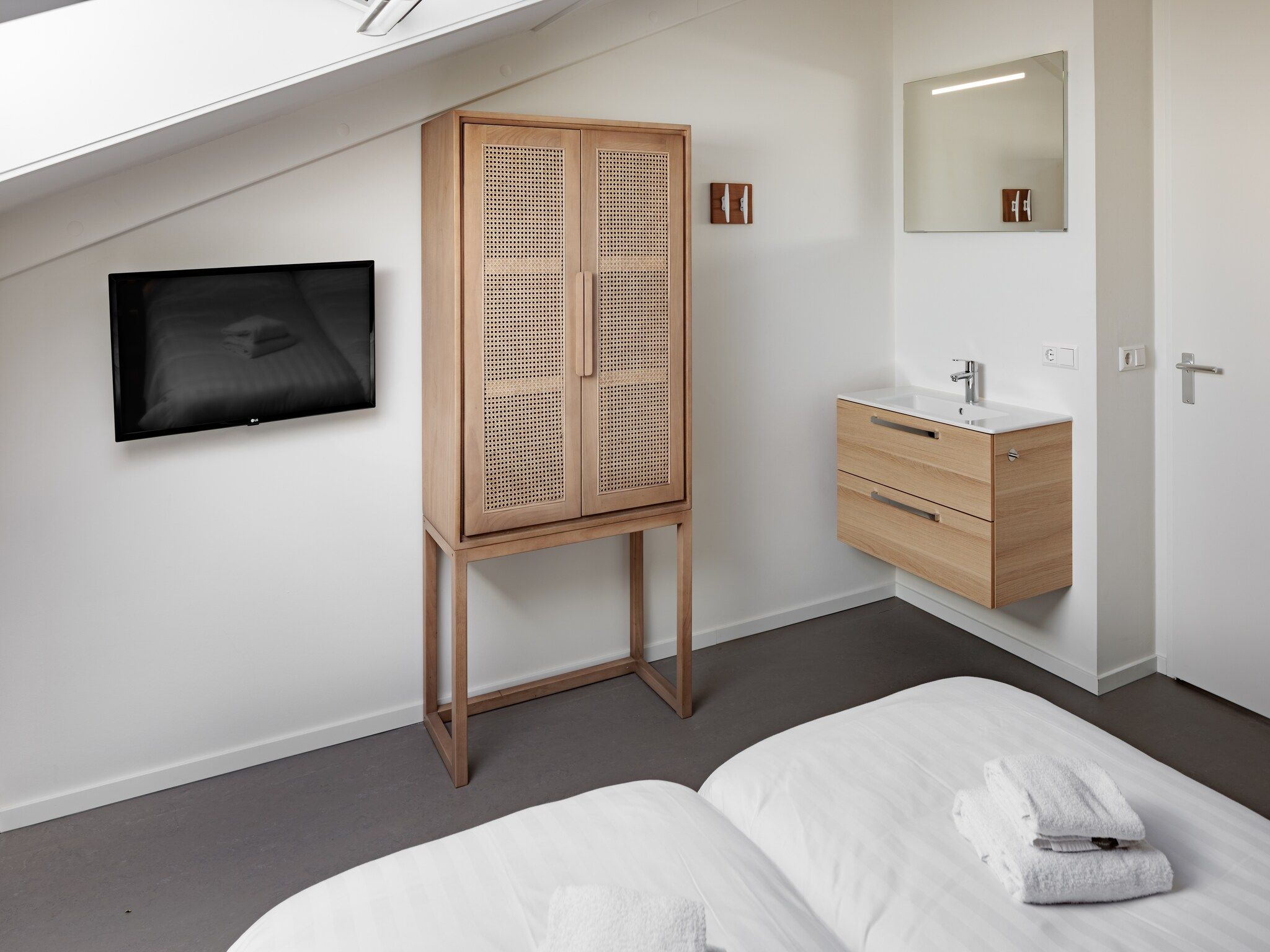 Een slaapkamer van Duinresort Dunimar 5 in Noordwijkerhout