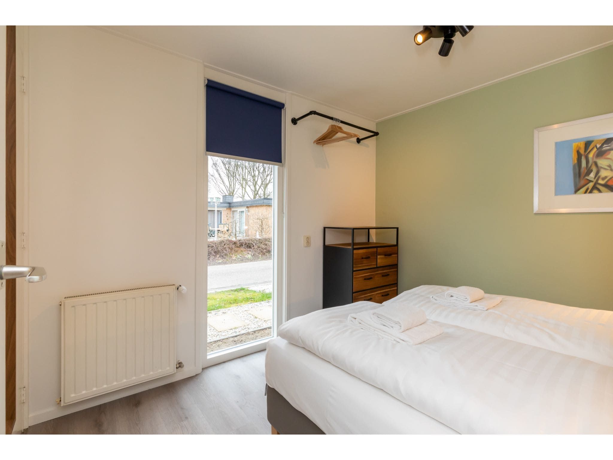Een slaapkamer van Inlaag 31 in Wolphaartsdijk