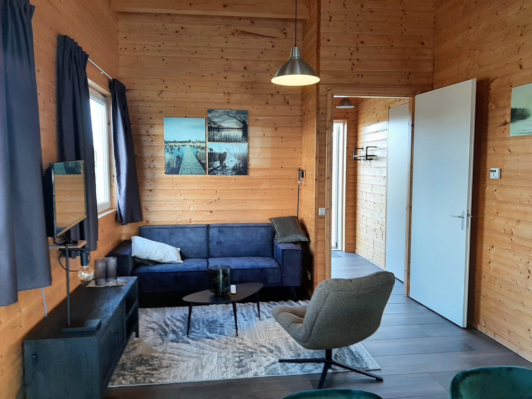 De woonkamer van Vakantiehuisje 19 in Someren-Heide