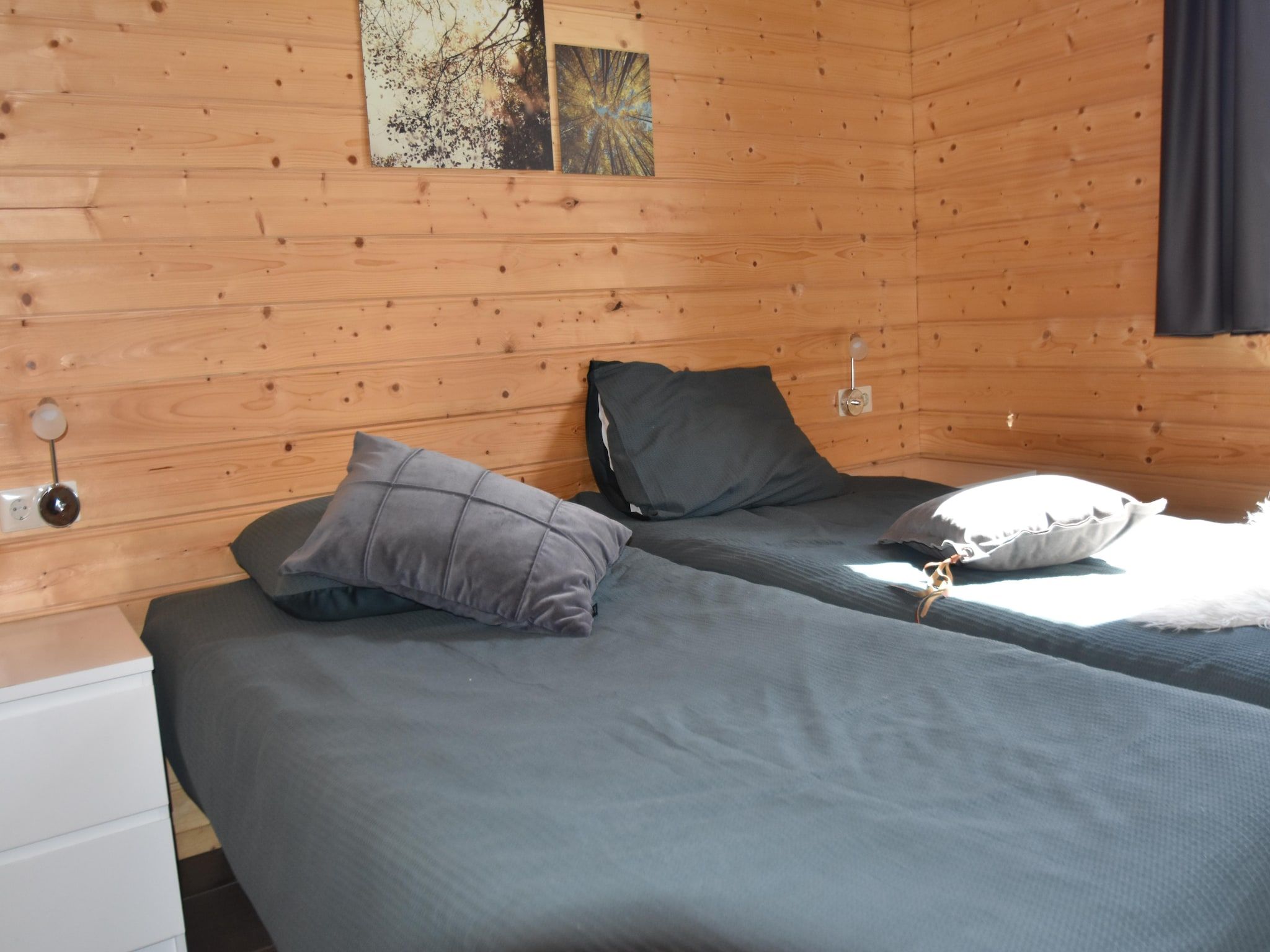 Een slaapkamer van Vakantiehuisje 19 in Someren-Heide