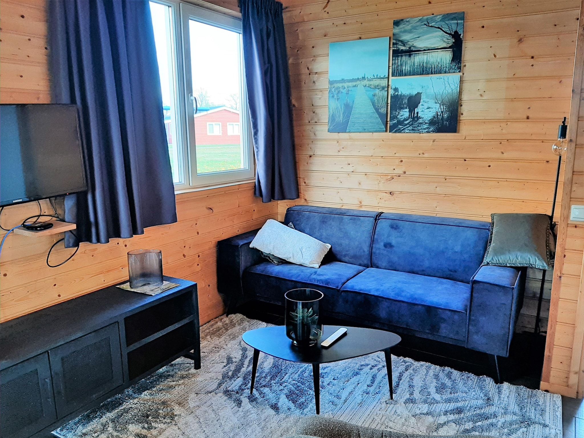 De woonkamer van Vakantiehuisje 19 in Someren-Heide