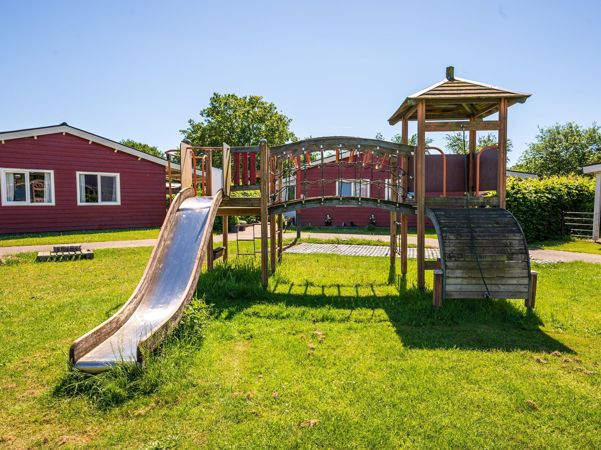 De tuin van Vakantiehuisje 19 in Someren-Heide