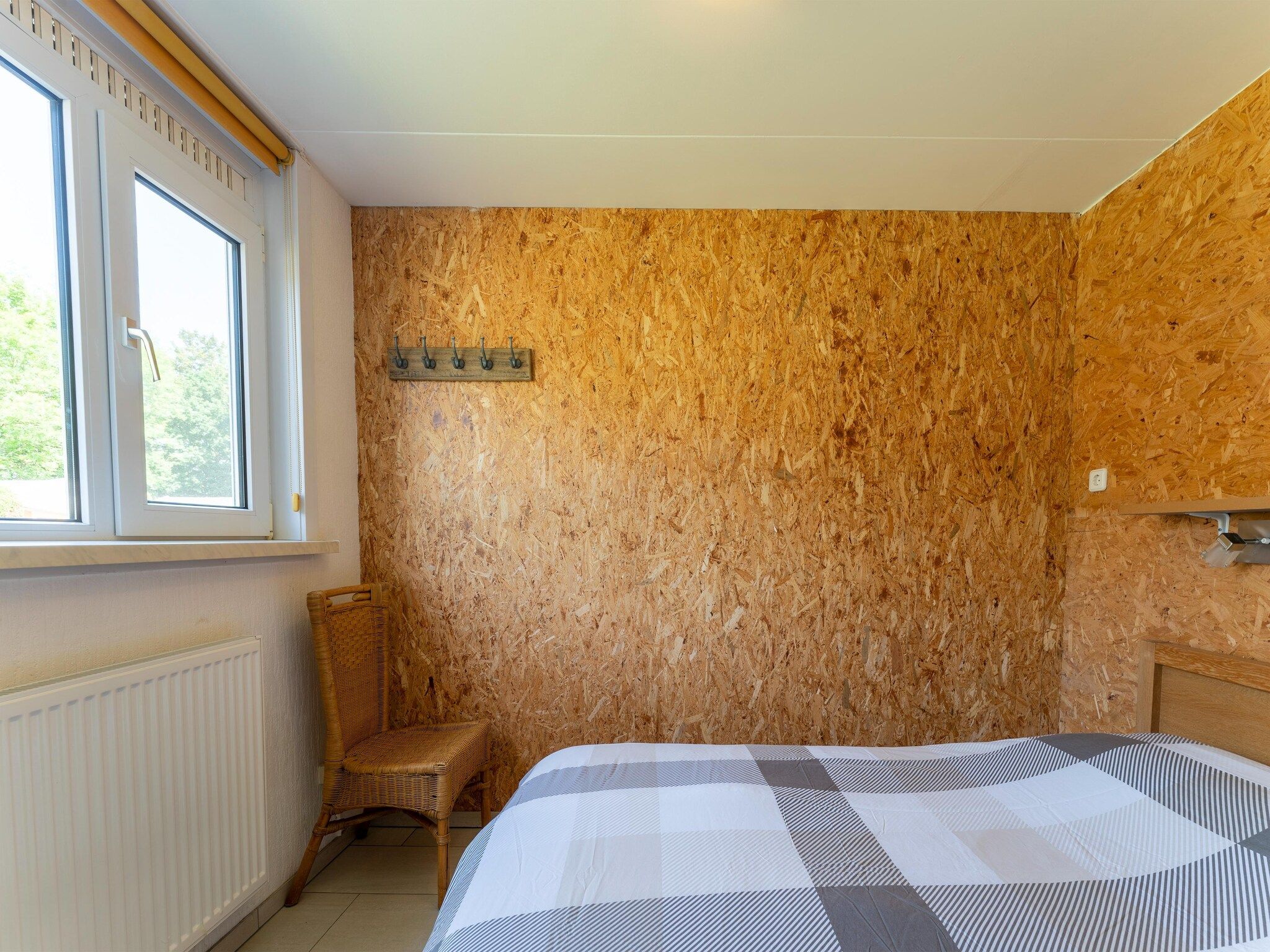 Een slaapkamer van Landingsweg 94 in Baarland