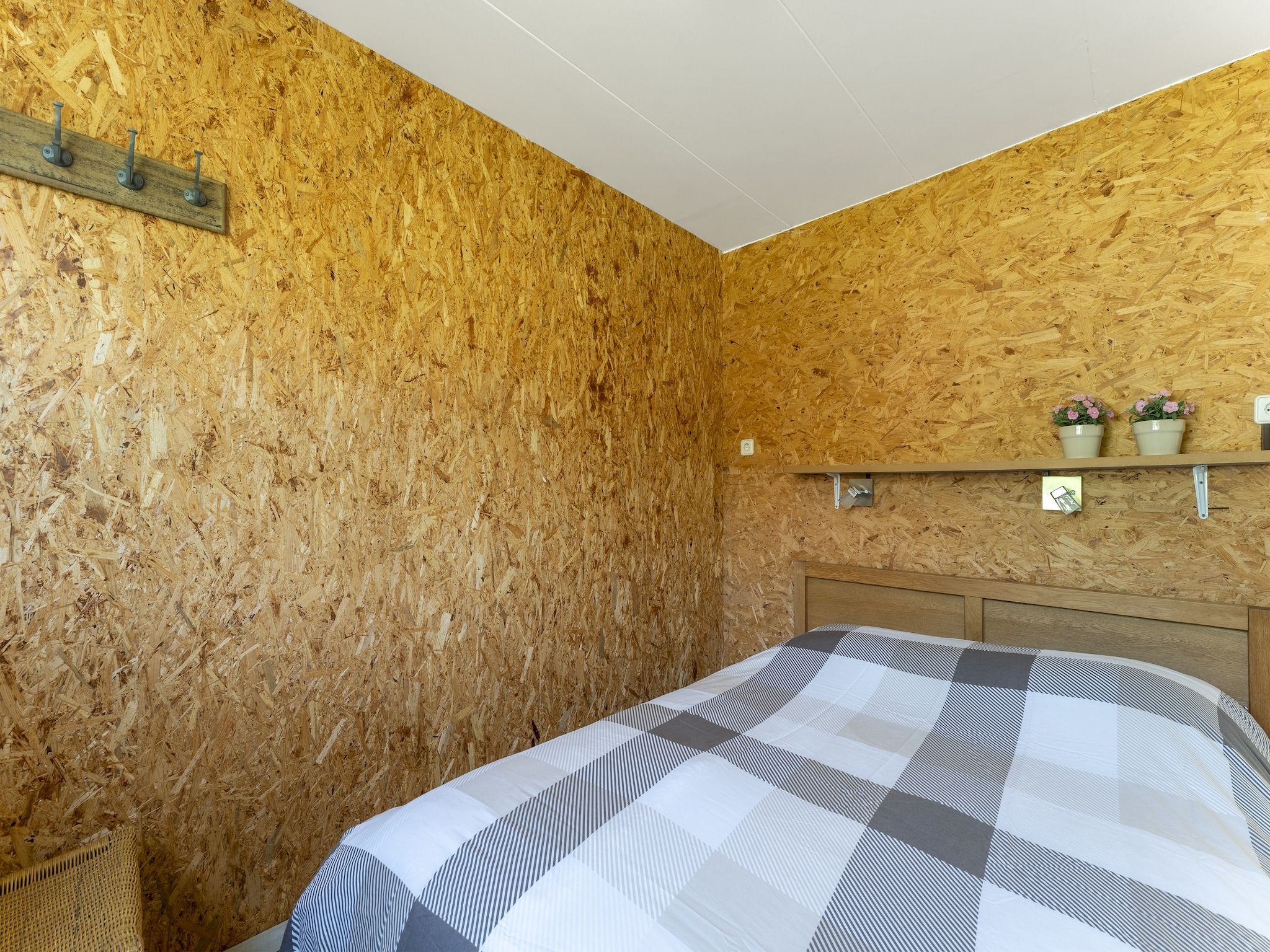 Een slaapkamer van Landingsweg 94 in Baarland