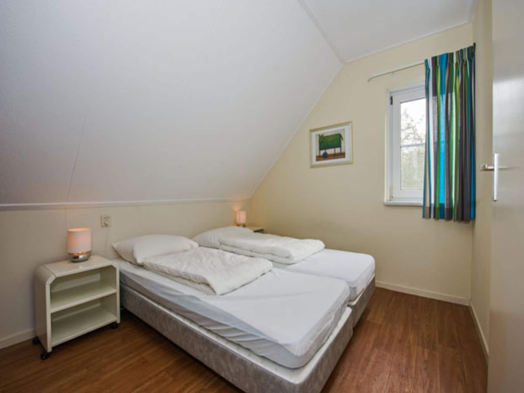 Een slaapkamer van Vakantiepark Hellendoorn 2 in Hellendoorn
