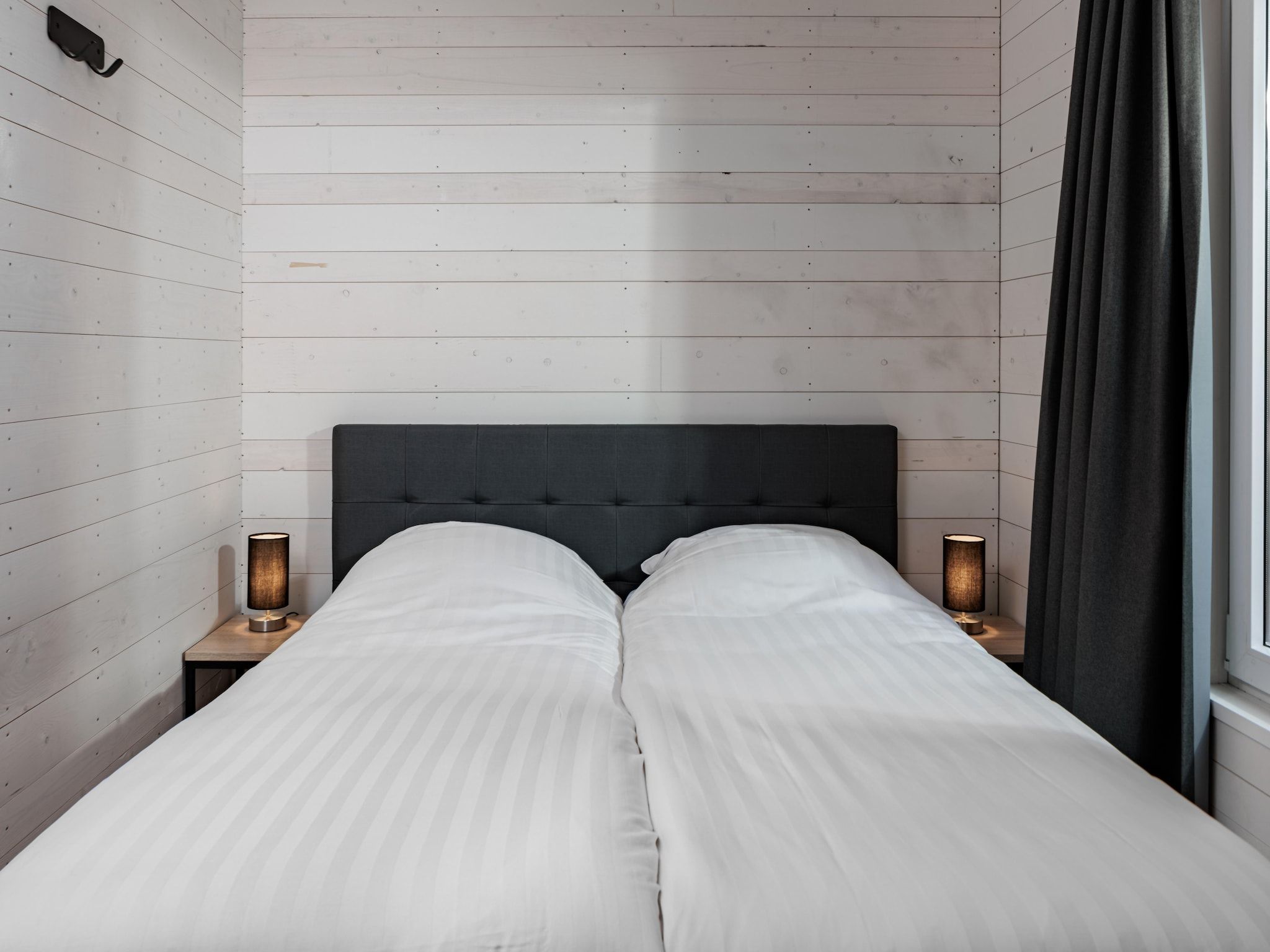 Een slaapkamer van Vakantiepark Schaijk 10 in Schaijk