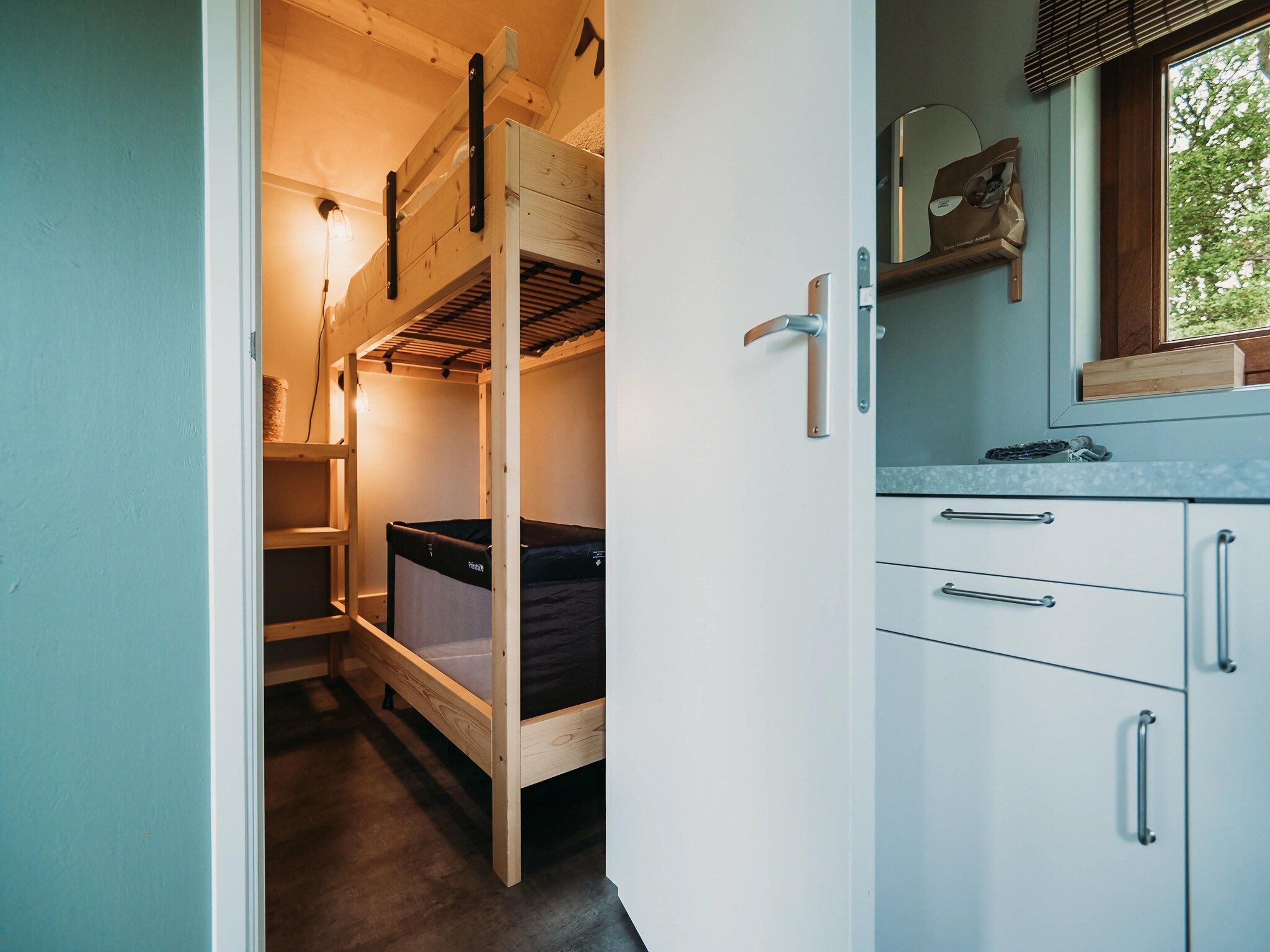 Een slaapkamer van Acker Lodges 4 in Ruinerwold