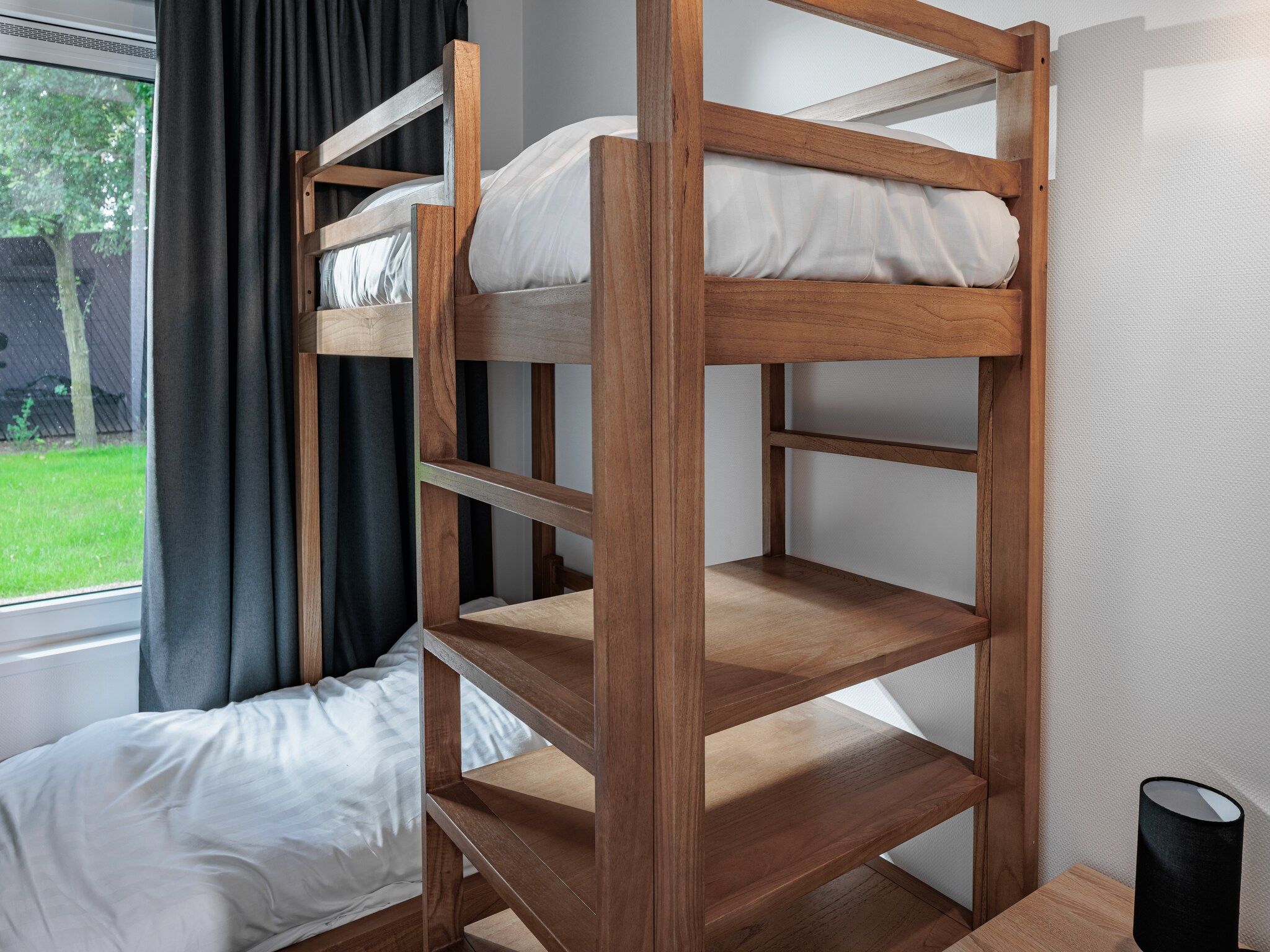 Een slaapkamer van Vakantiepark Schaijk 11 in Schaijk