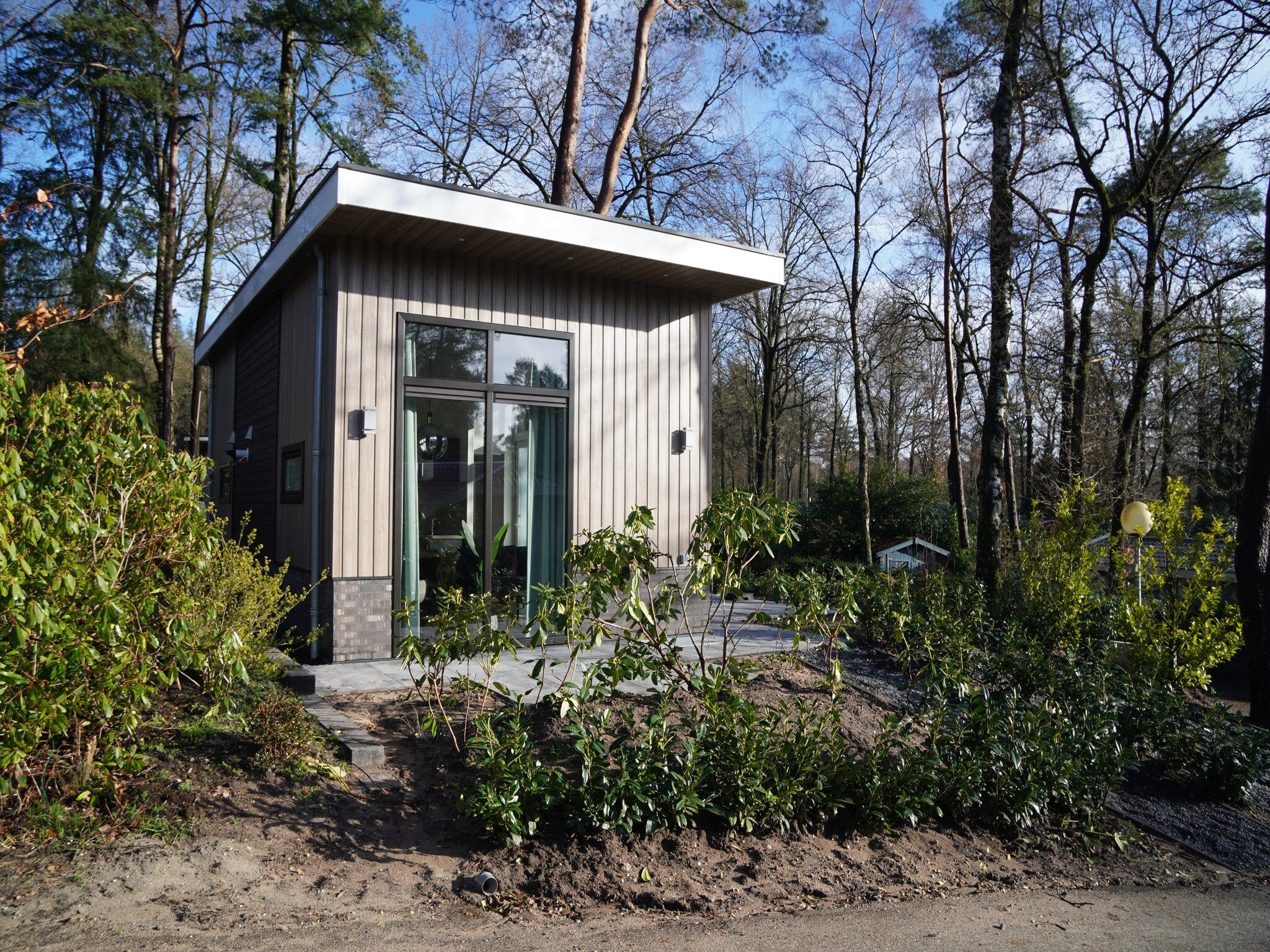 De buitenkant van Vakantiepark De Rimboe & De Woeste Hoogte 41 in Hoenderloo