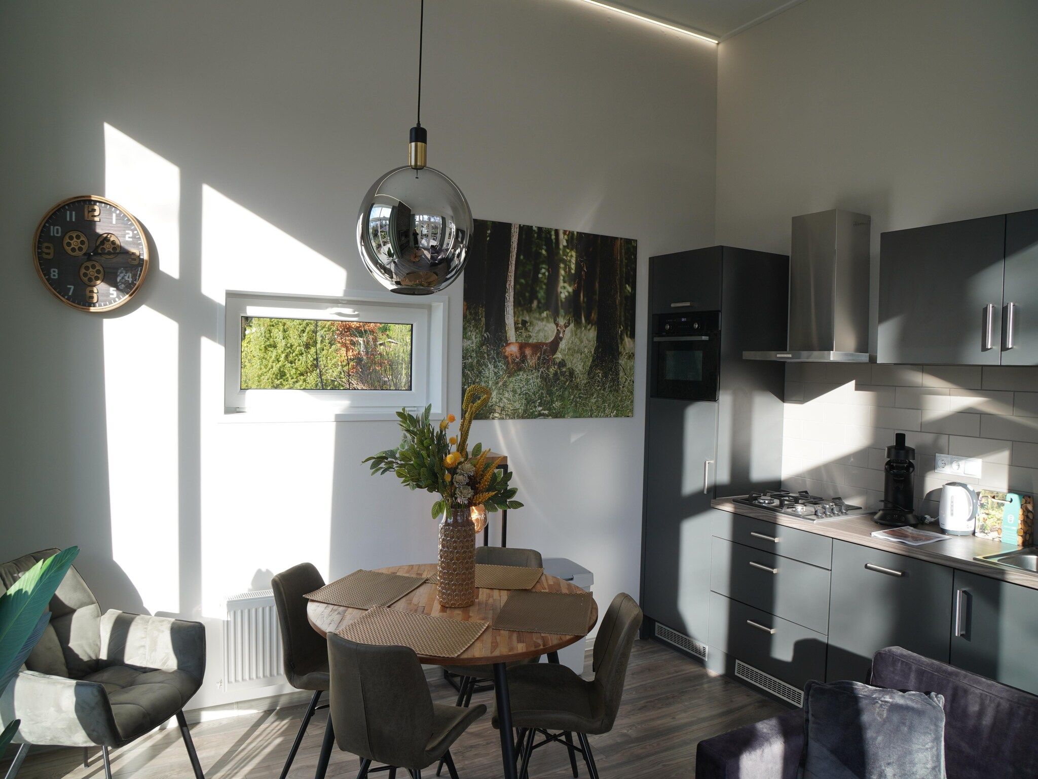 De woonkamer van Vakantiepark De Rimboe & De Woeste Hoogte 41 in Hoenderloo