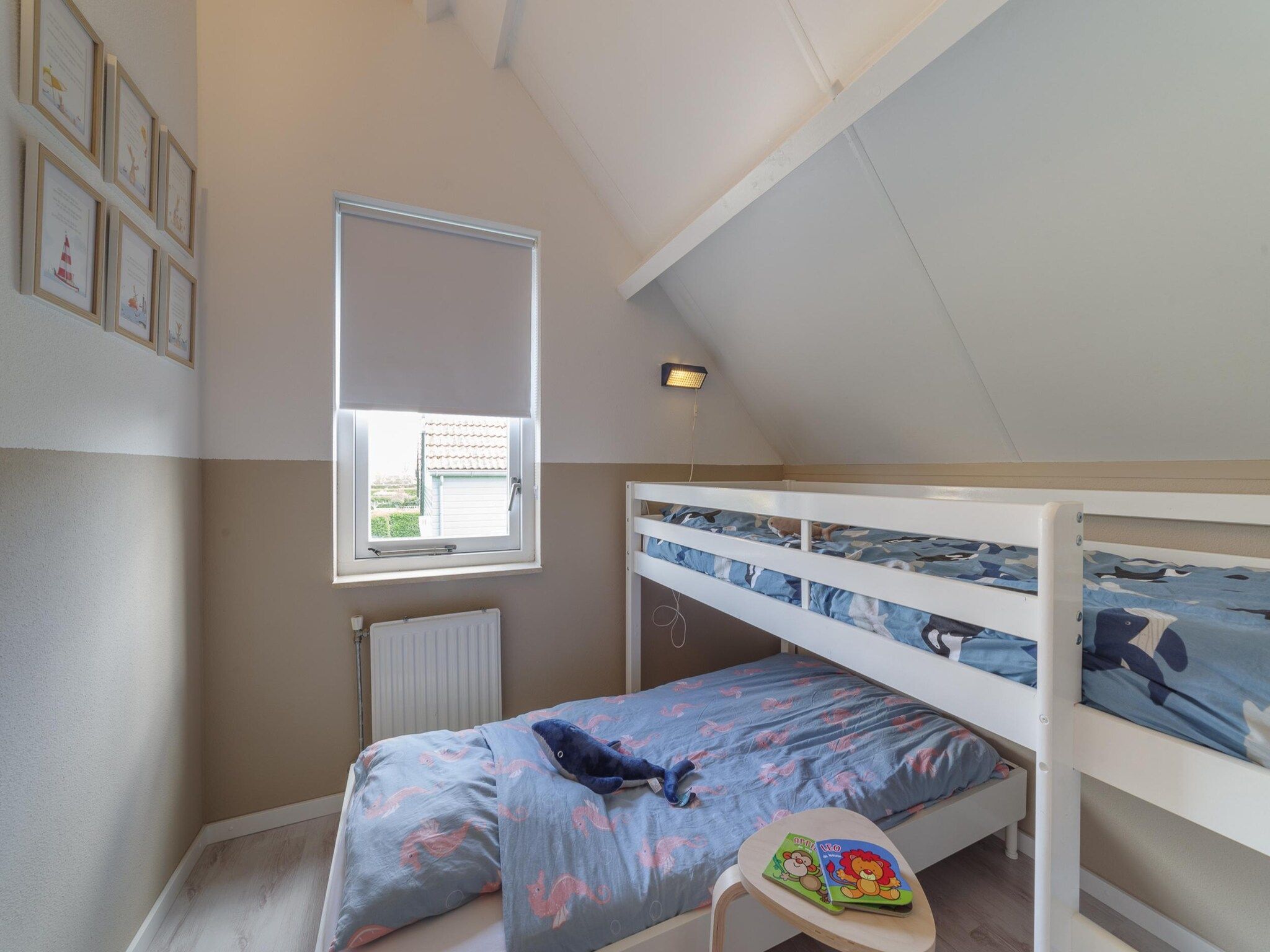 Een slaapkamer van Villapark De Oesterbaai 68 in Wemeldinge