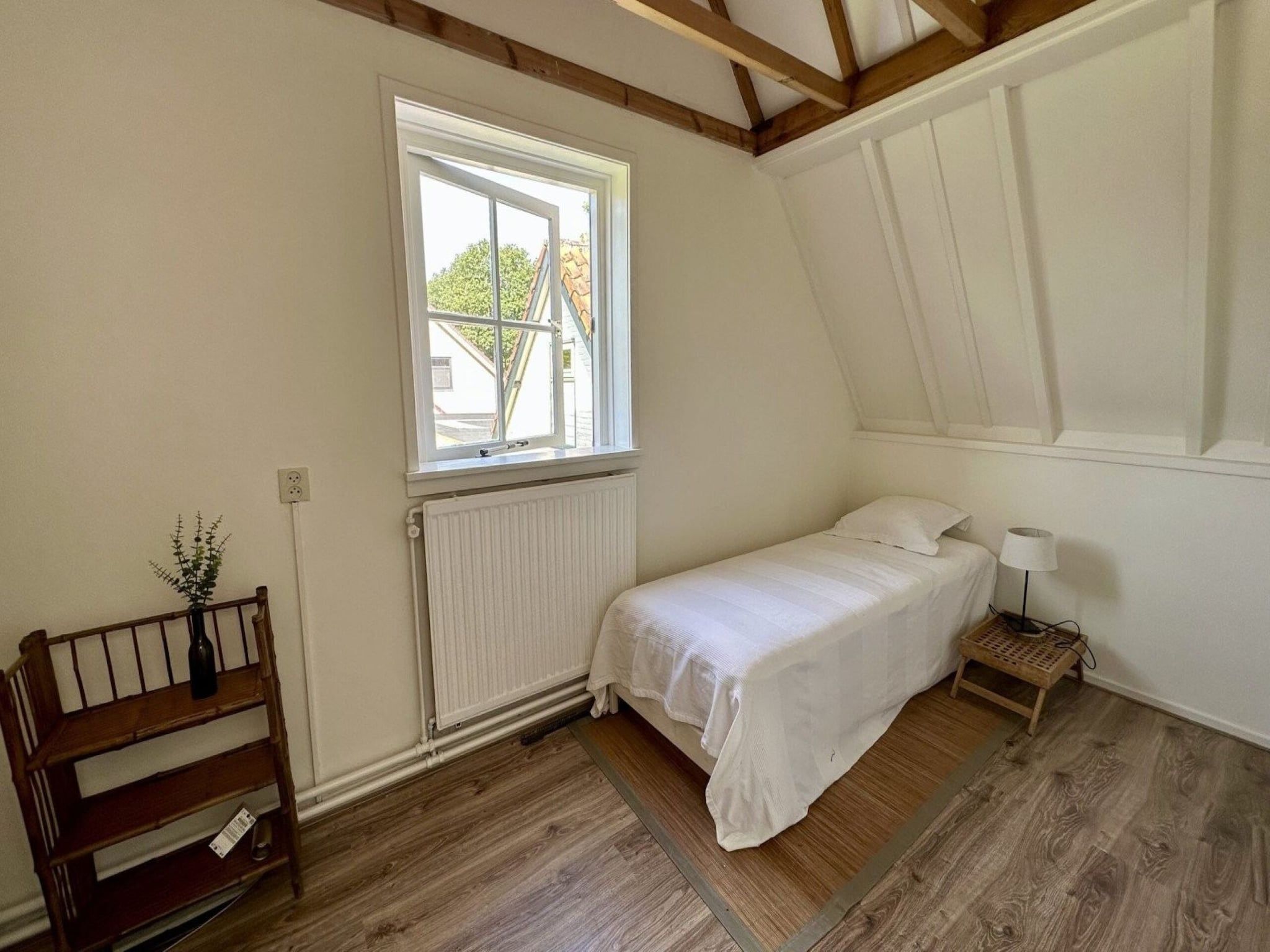 Een slaapkamer van Vakantiehuis Fijn in Bergen