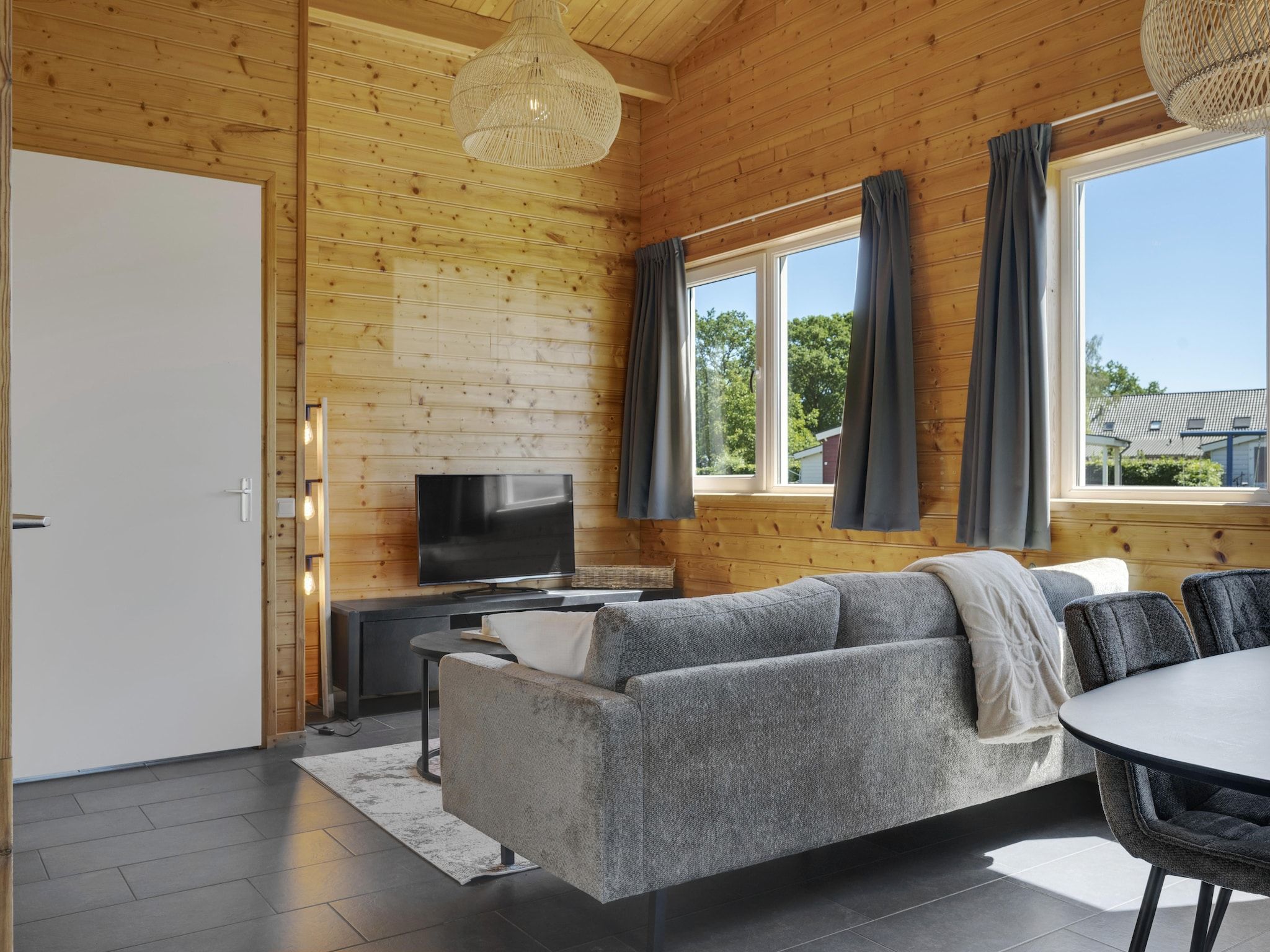 De woonkamer van Vakantiehuisje 20 in Someren-Heide