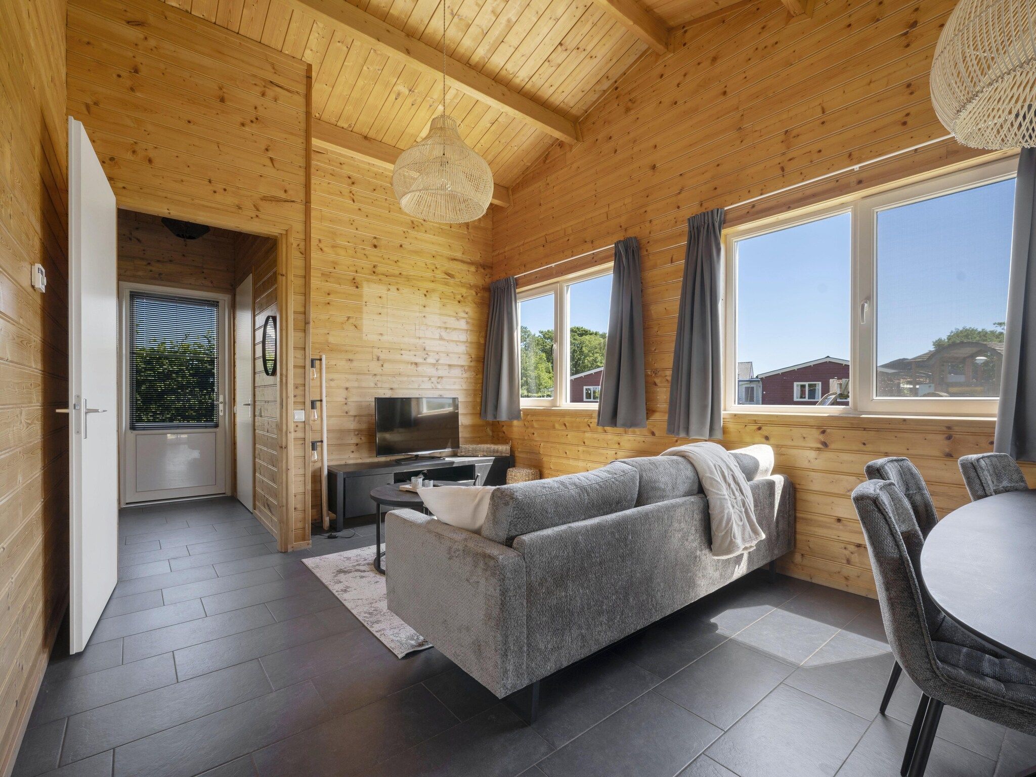 De woonkamer van Vakantiehuisje 20 in Someren-Heide