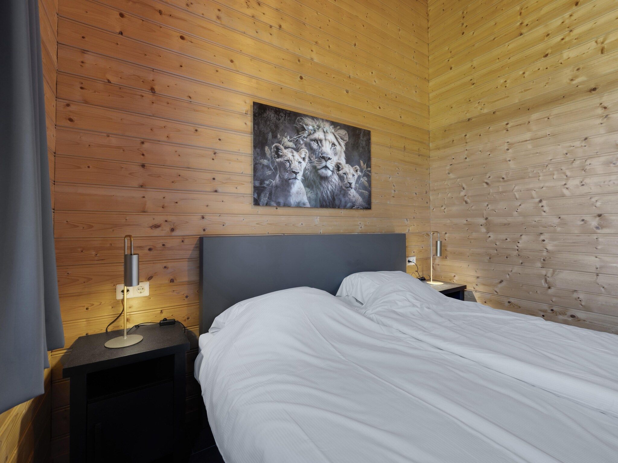Een slaapkamer van Vakantiehuisje 20 in Someren-Heide